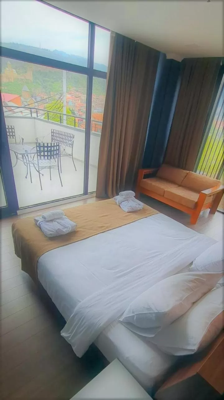 View (from property/room), Bed in Bricks Hotel