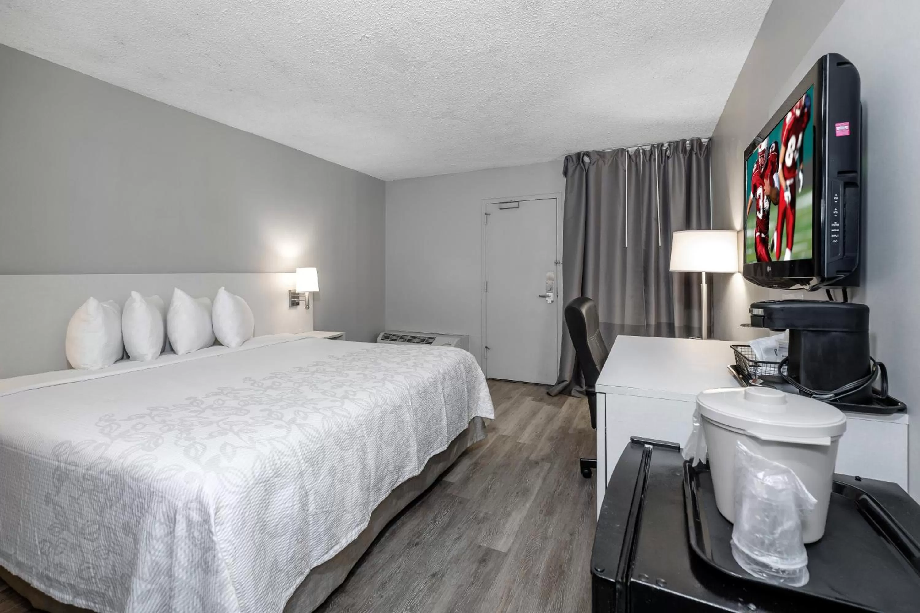 Photo of the whole room in Red Roof Inn PLUS Orlando-Convention Center- Int'l Dr