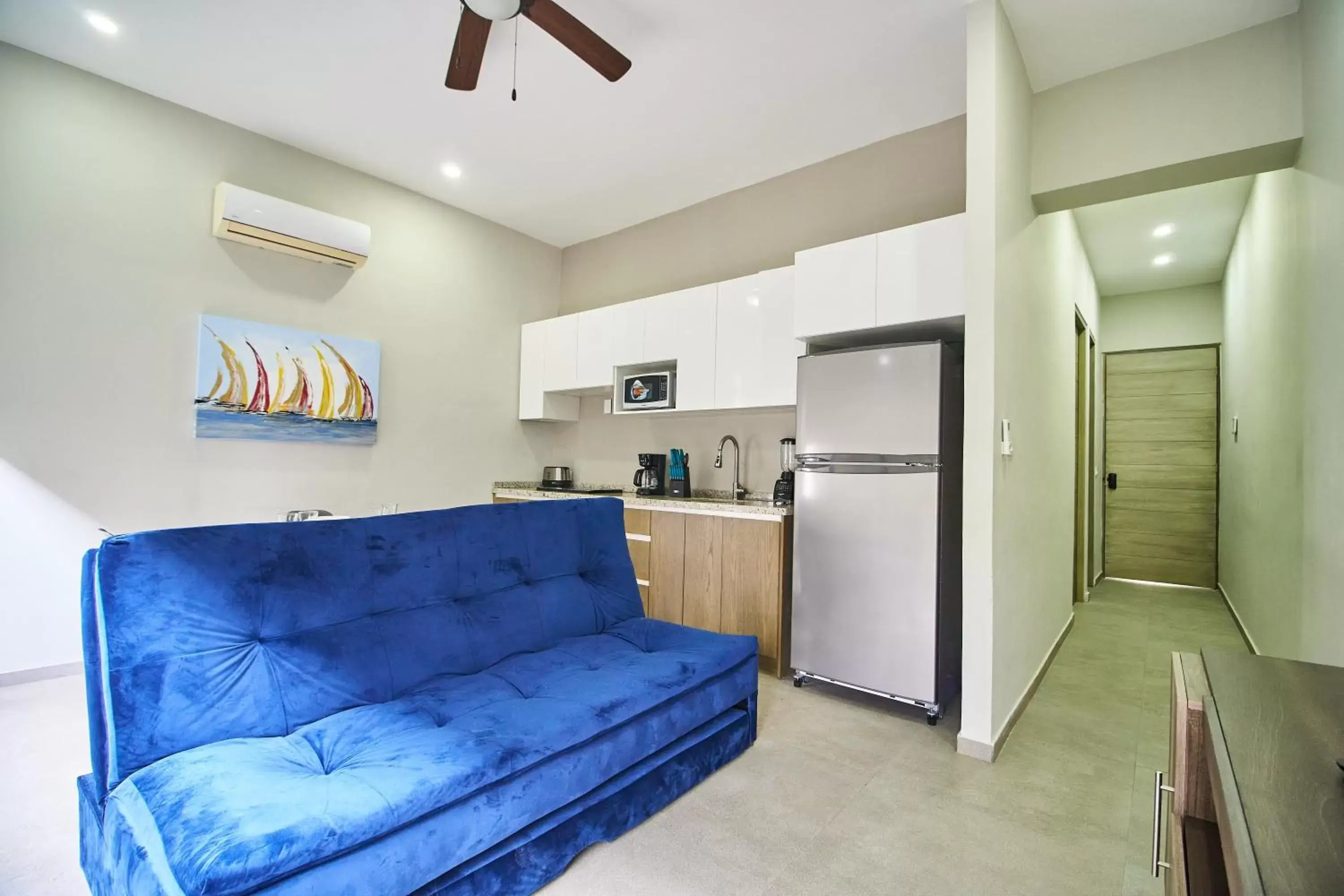 Kitchen or kitchenette, Seating Area in Torre 42 Playa del Carmen by Lockey