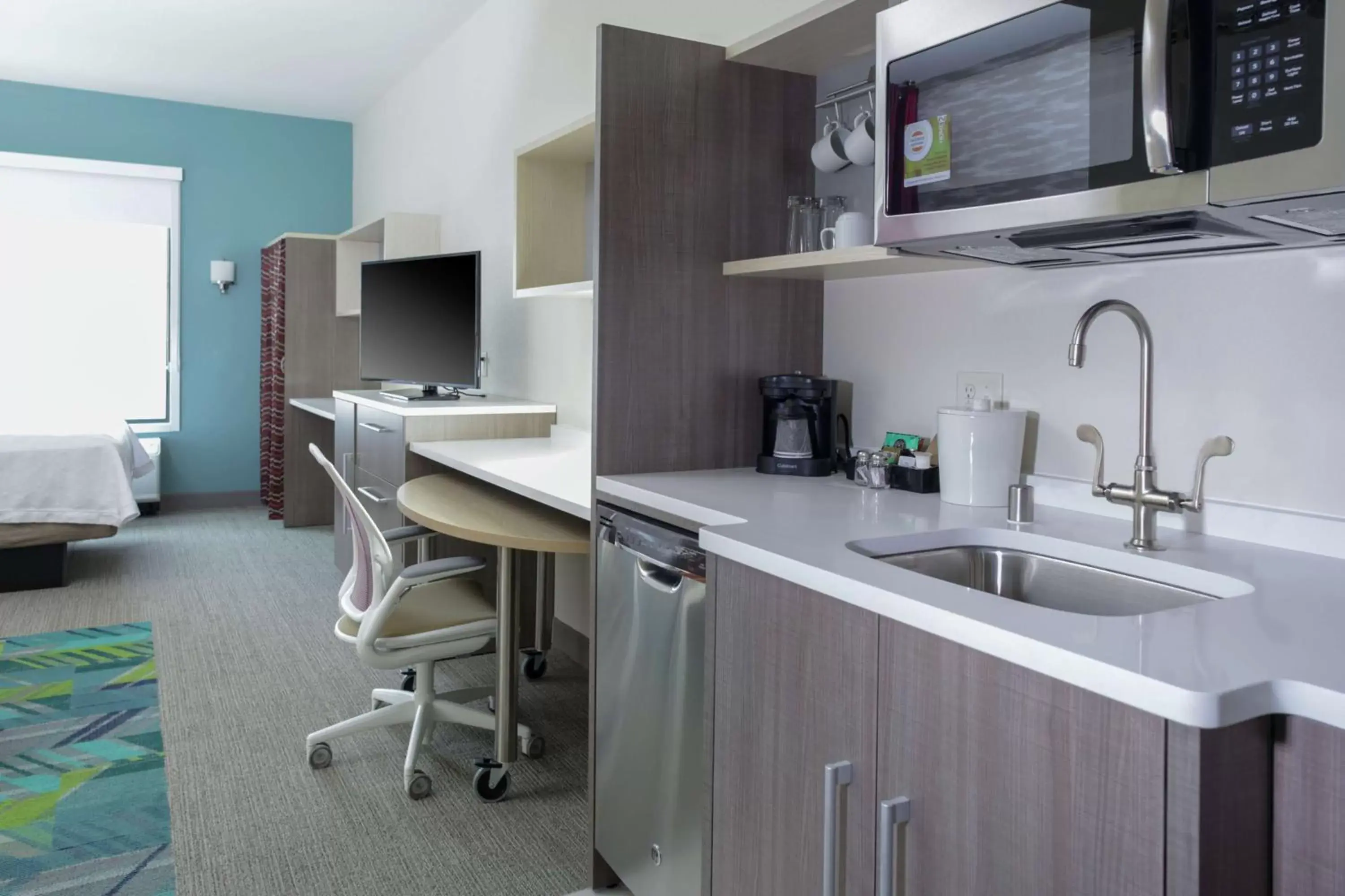 Bedroom, Kitchen/Kitchenette in Home2 Suites By Hilton Fort Collins