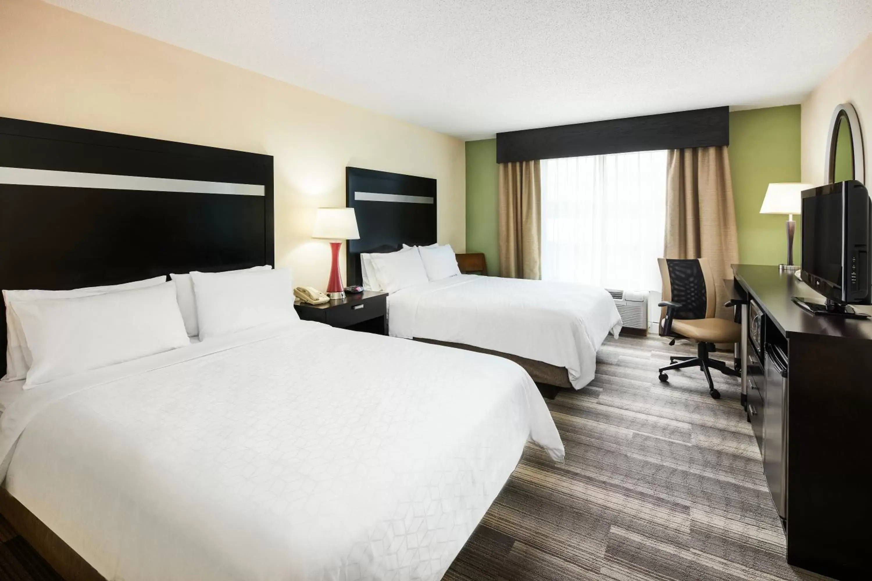 Bed in Holiday Inn Express & Suites I-26 & Us 29 At Westgate Mall, an IHG Hotel