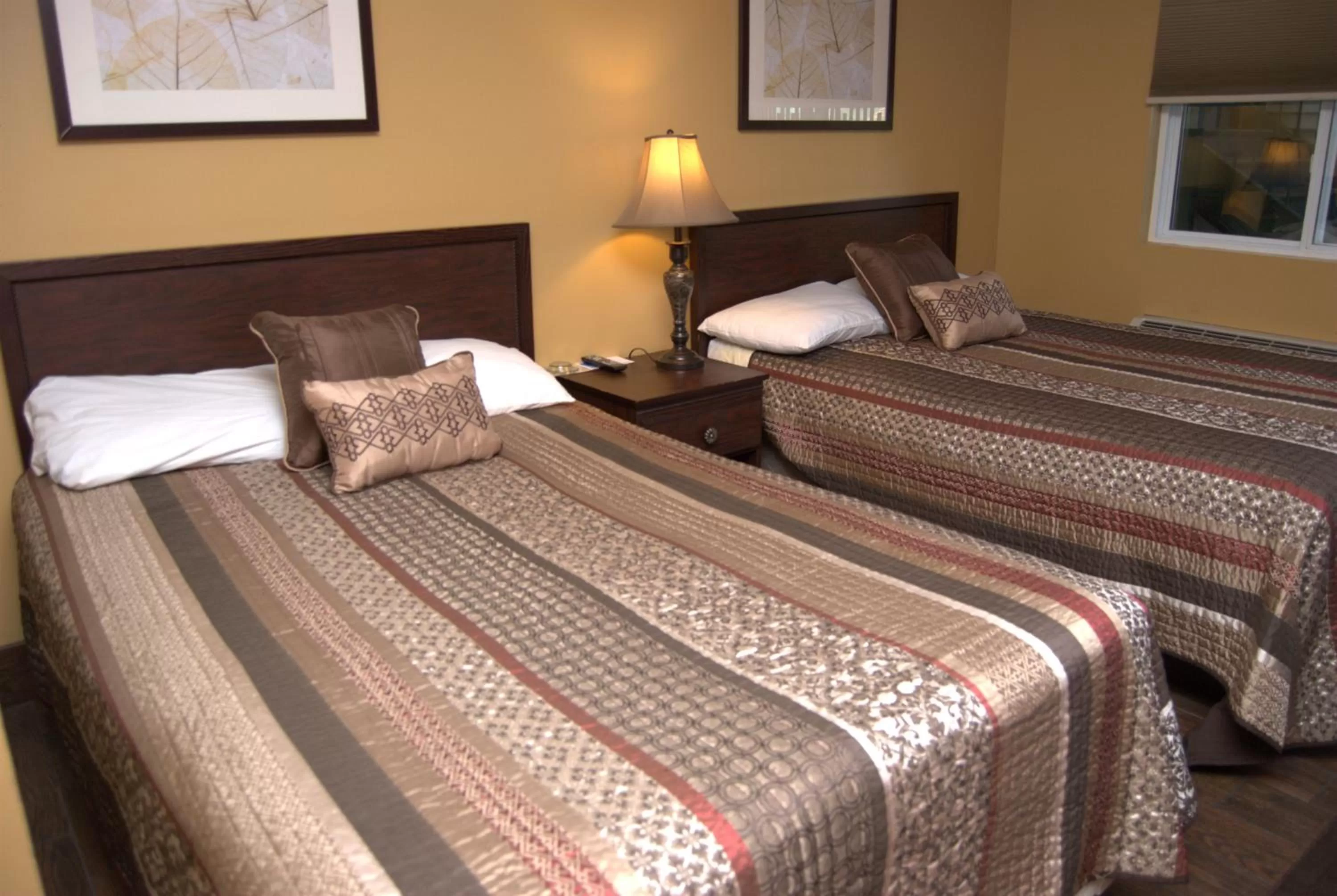 Bed, Room Photo in Commodore Resort