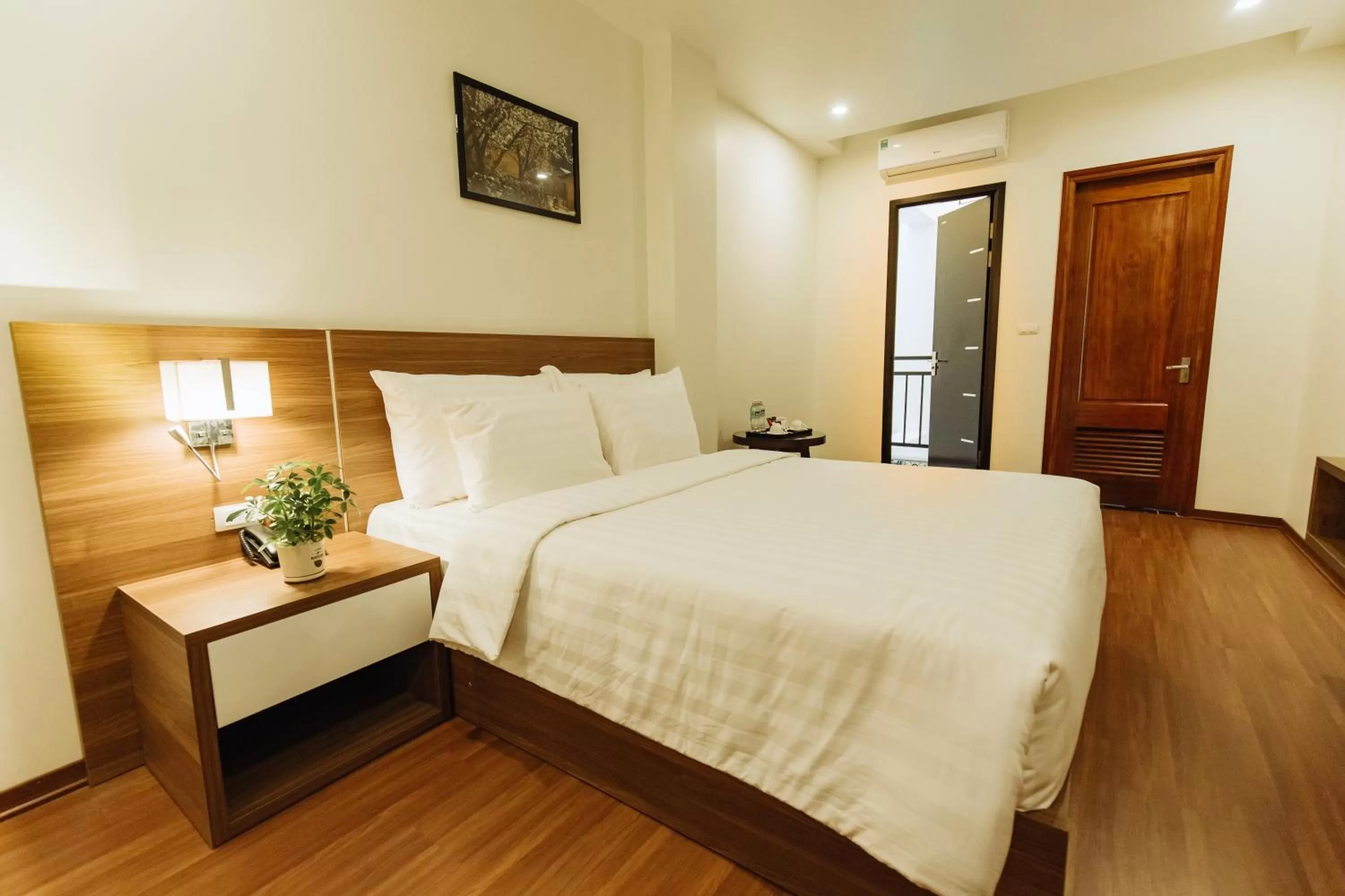 Bed in Paragon Noi bai Hotel & Pool