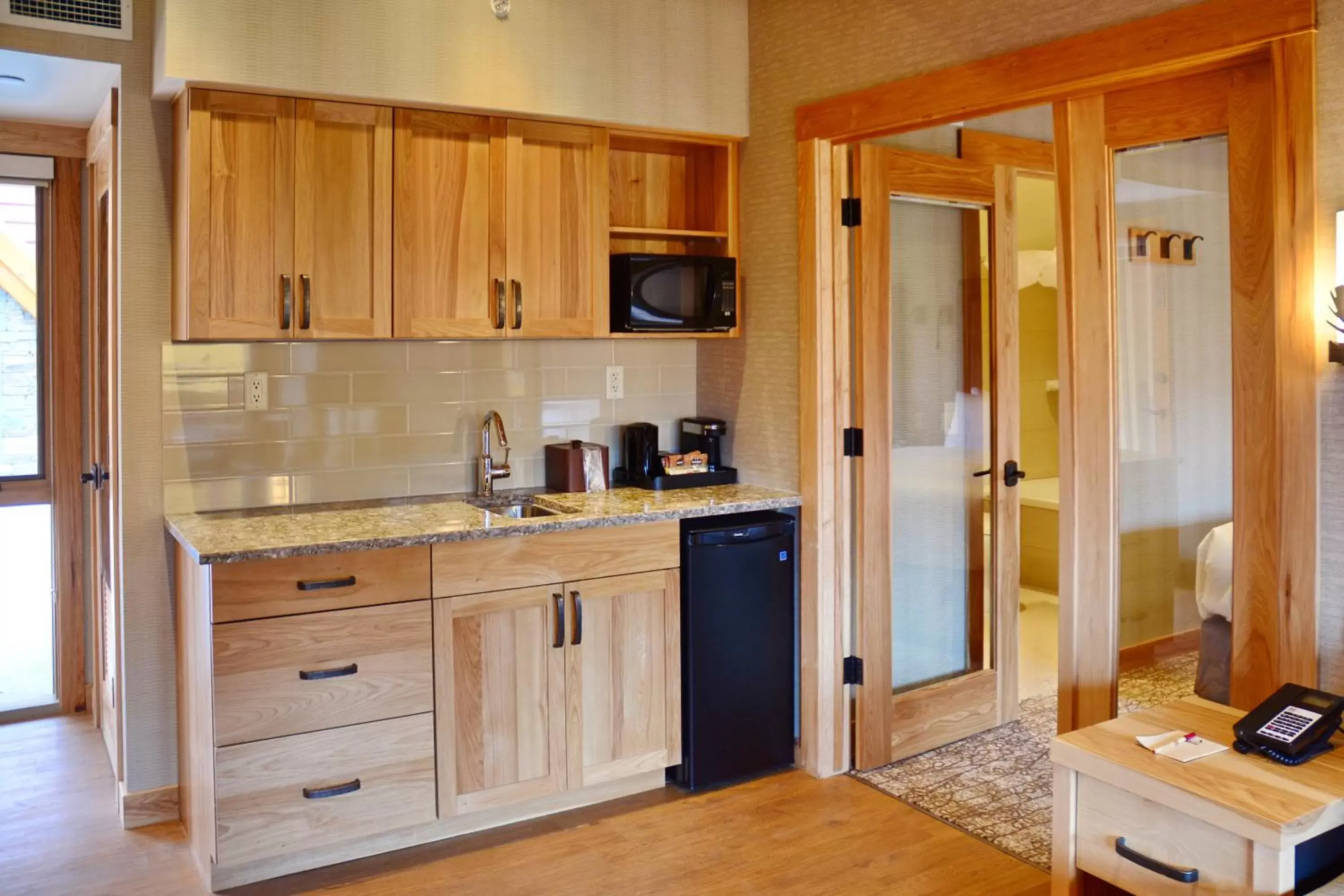 Kitchen or kitchenette, Kitchen/Kitchenette in Moose Hotel and Suites