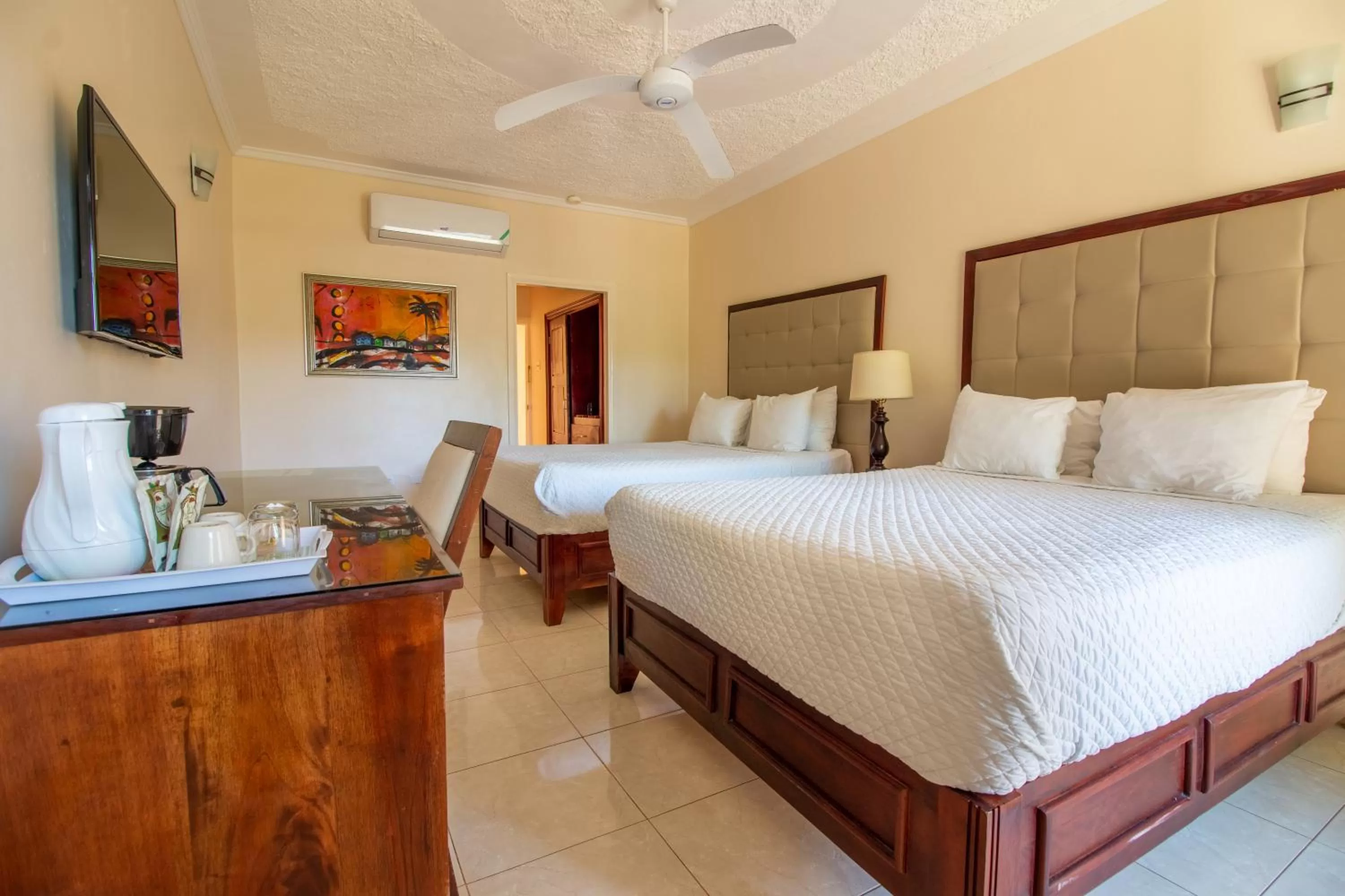 Photo of the whole room, Bed in Travellers Beach Resort