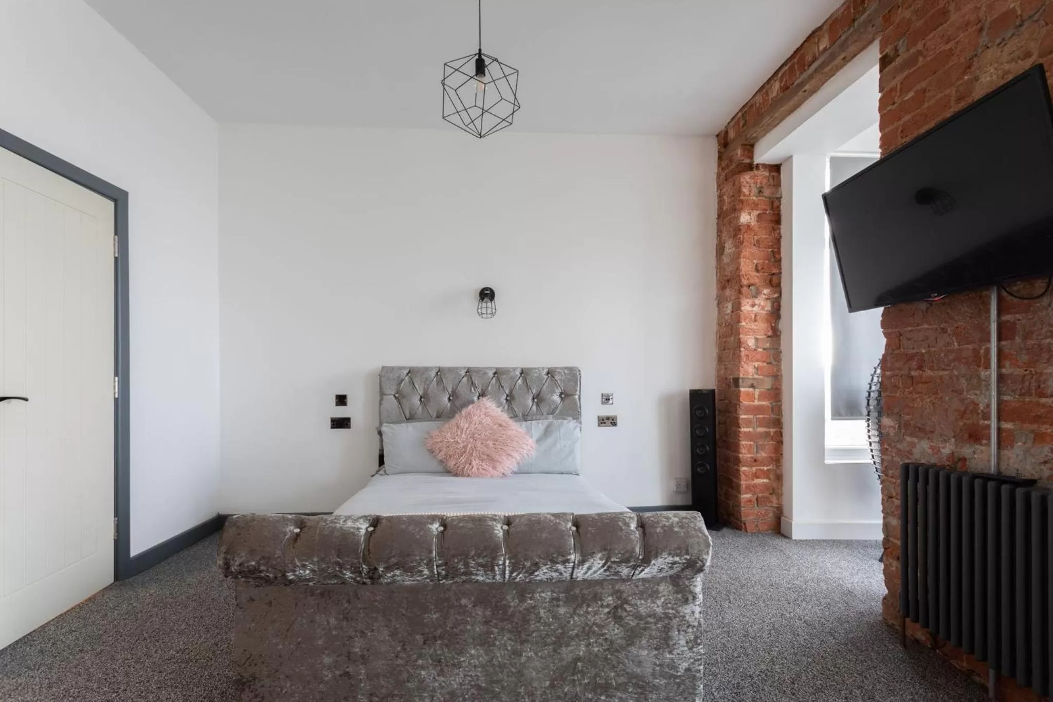 Bed in RESIDENCY LUXURY SEAFRONT HOTEL