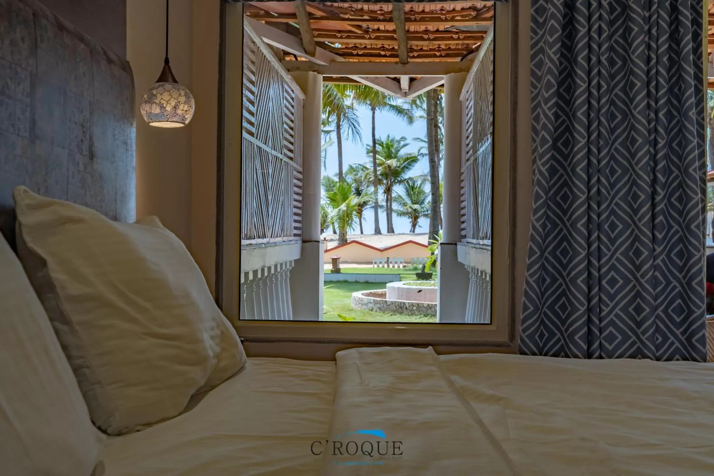 Bed in C Roque Beach Resort