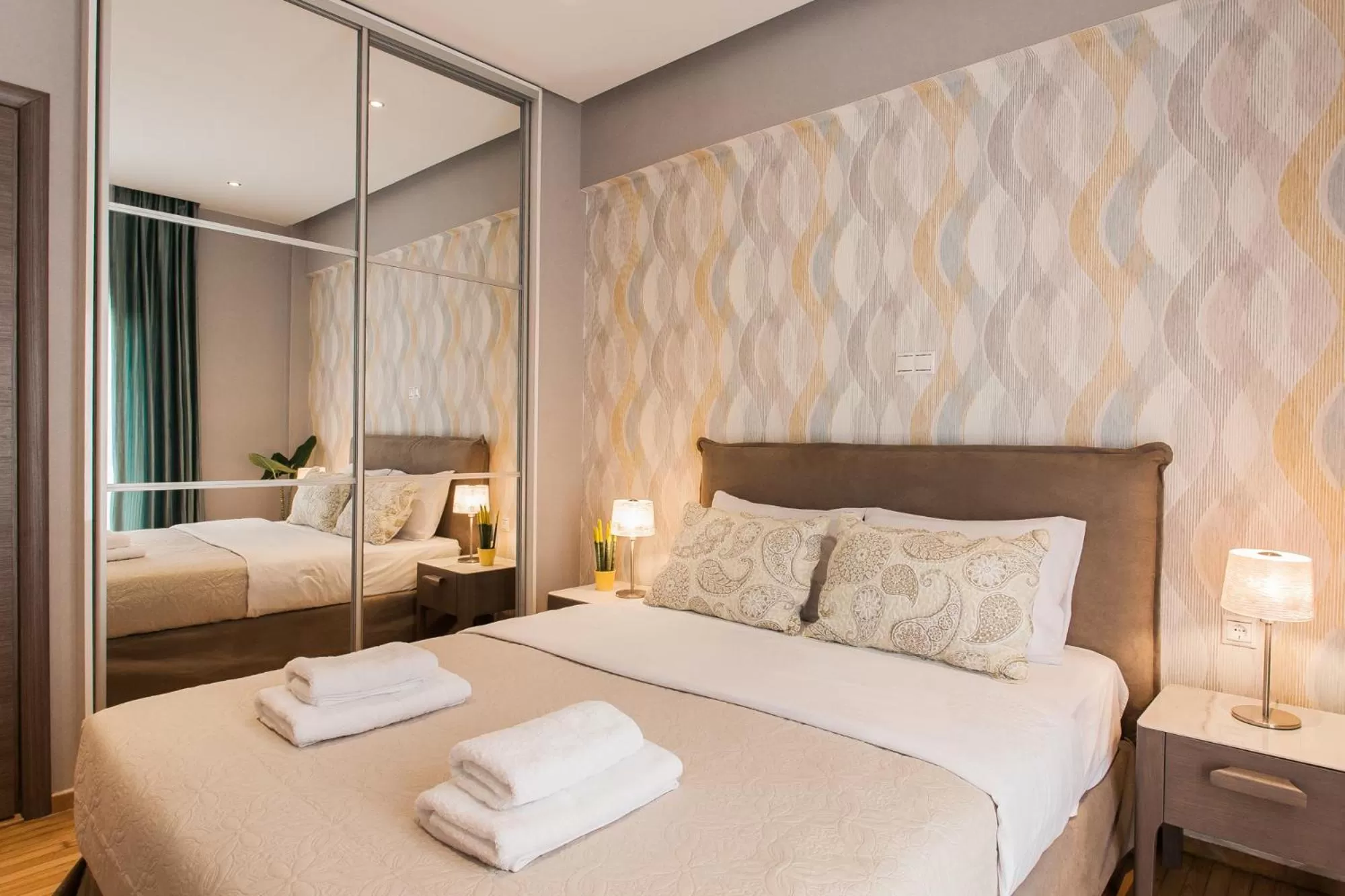 Bedroom, Bed in Nicholas Point Apartments and Rooms