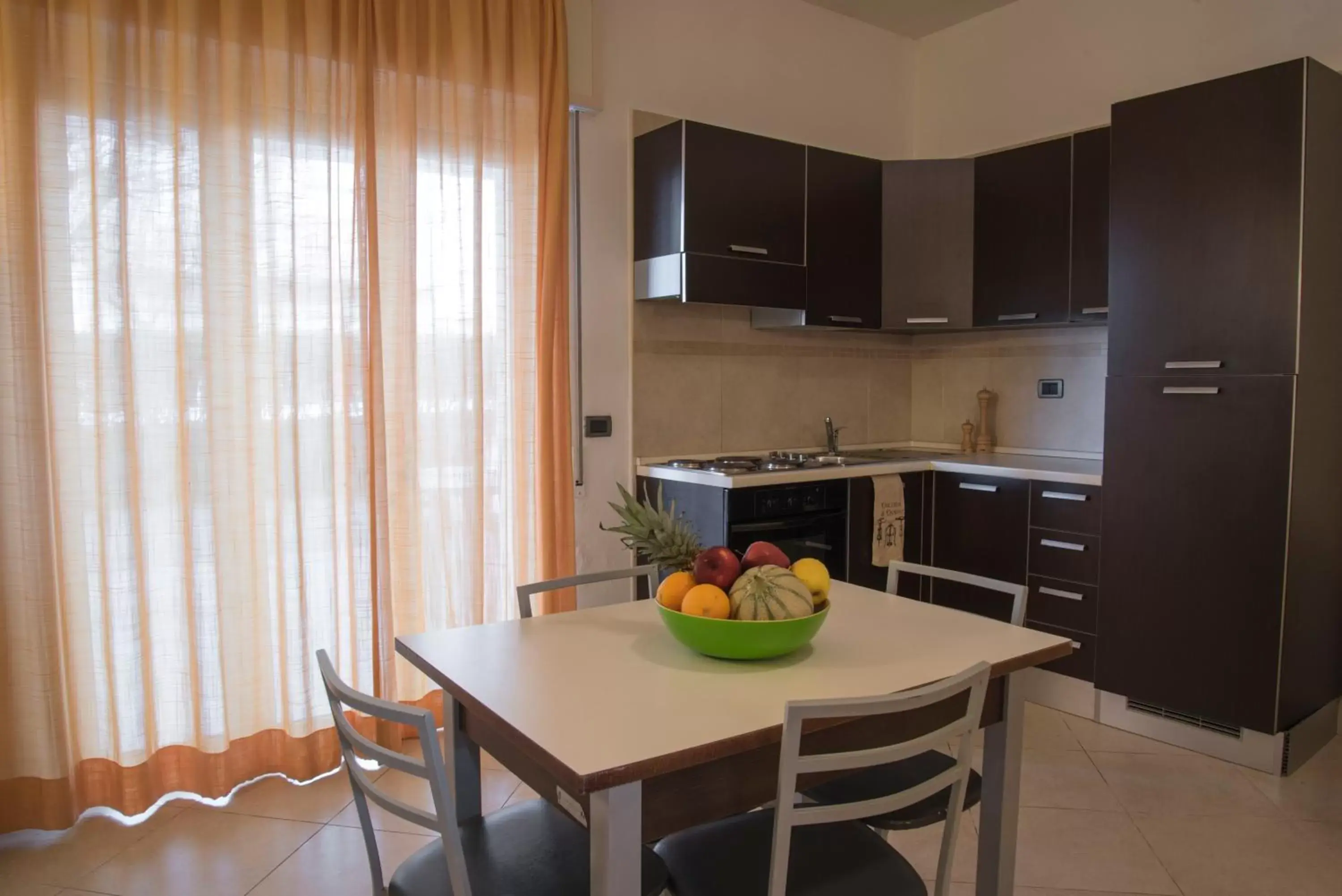 Kitchen/Kitchenette in Hotel Riva Del Sole