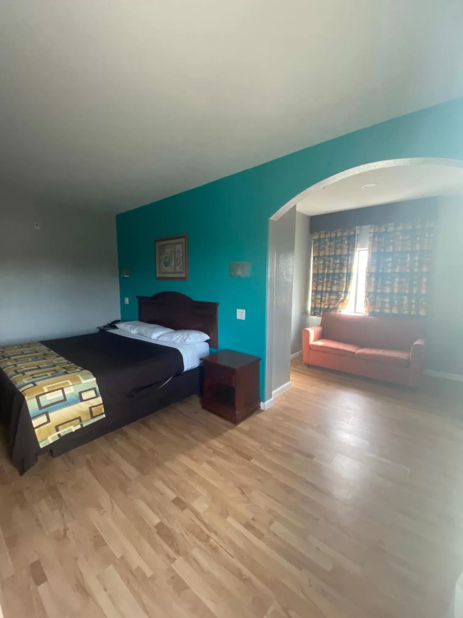 Bed in Tropicana Inn and Suites