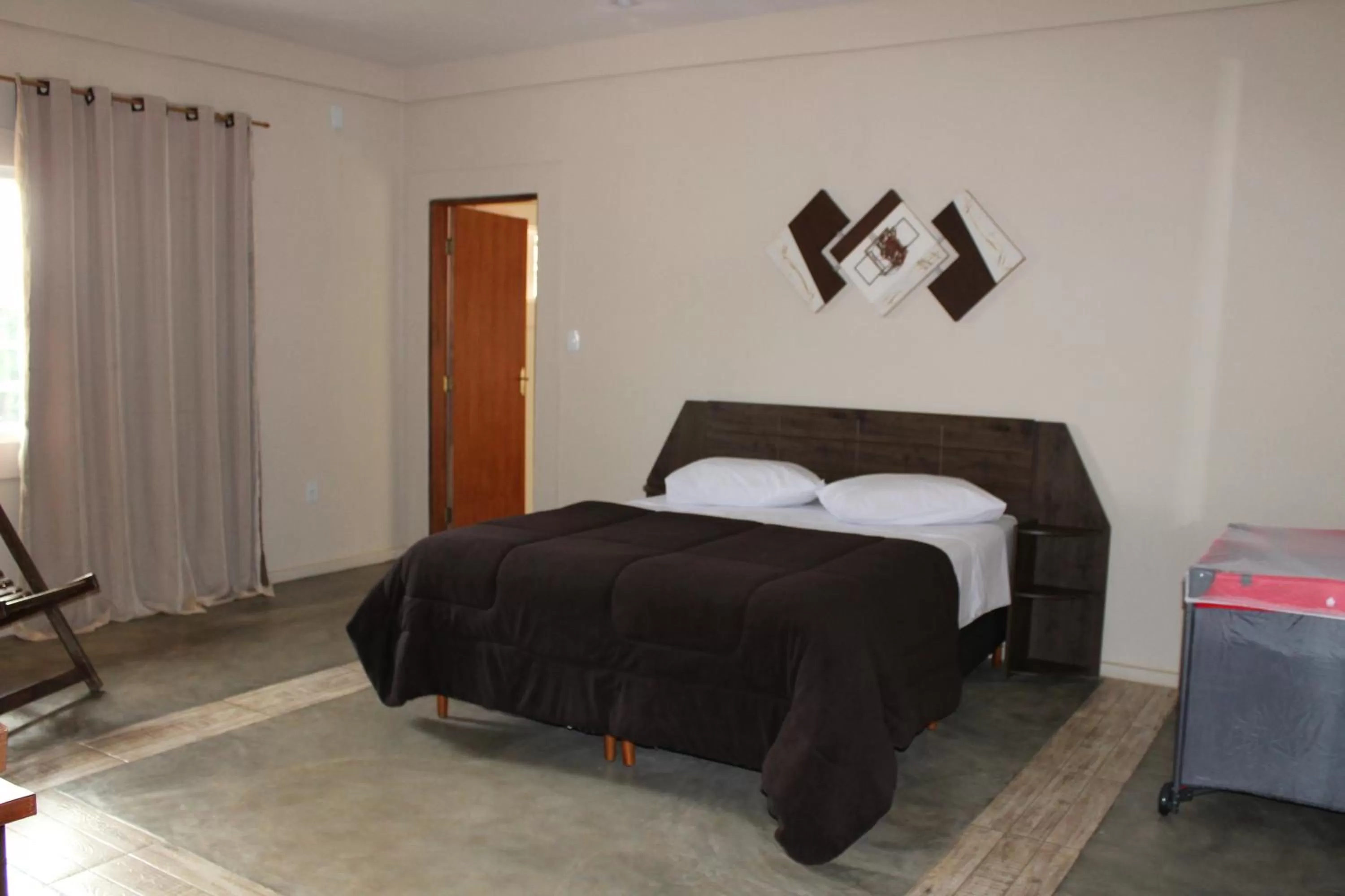 Bed in Pousada Morro dos Ventos