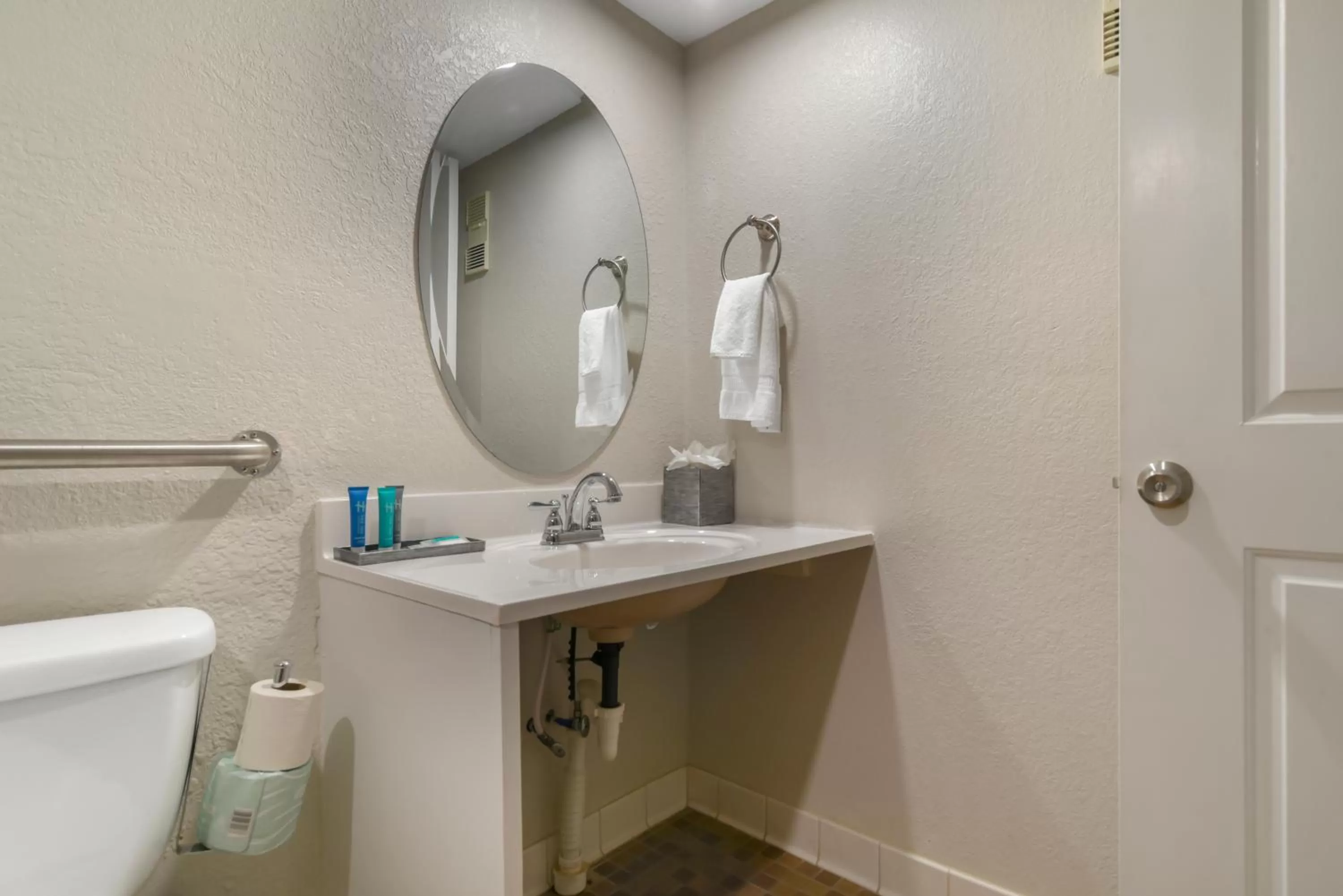 Toilet in Inn on Destin Harbor, an Ascend Collection Hotel