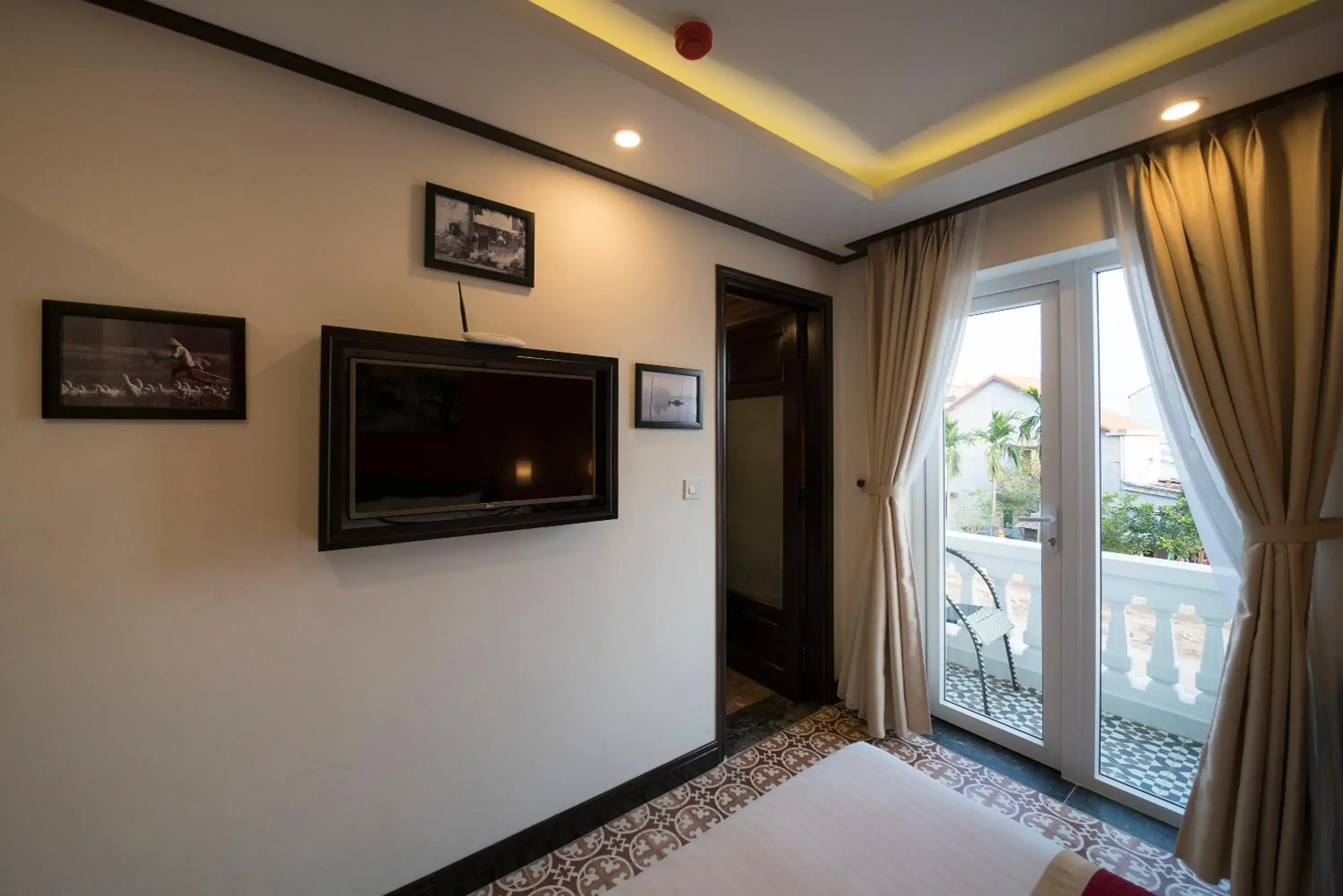 Bedroom, TV/Entertainment Center in Golden Bell Hoi An Boutique Villa