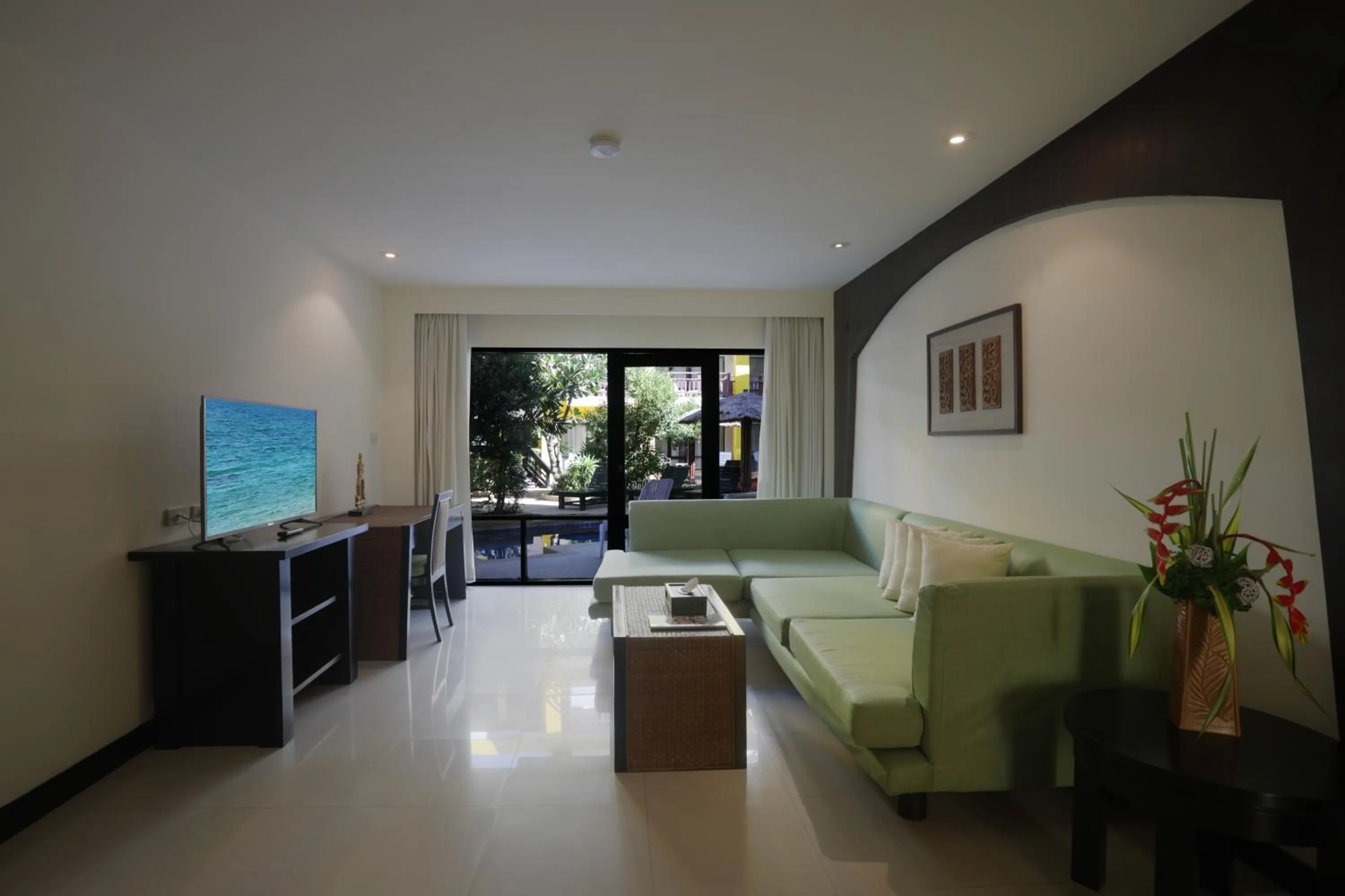 Living room in Woraburi Phuket Resort & Spa - SHA Plus