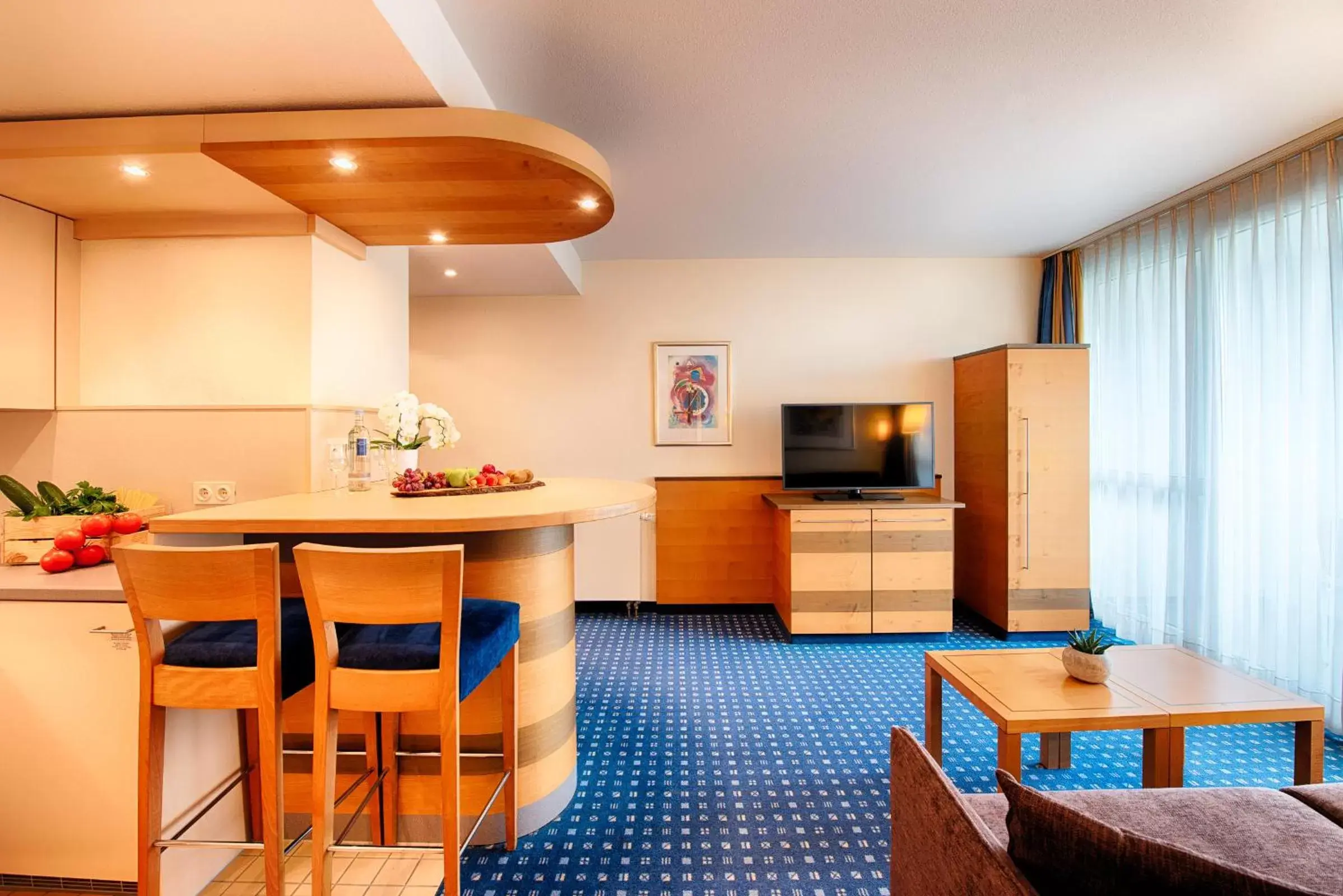 Living room, Kitchen/Kitchenette in Welcome Hotel Wesel