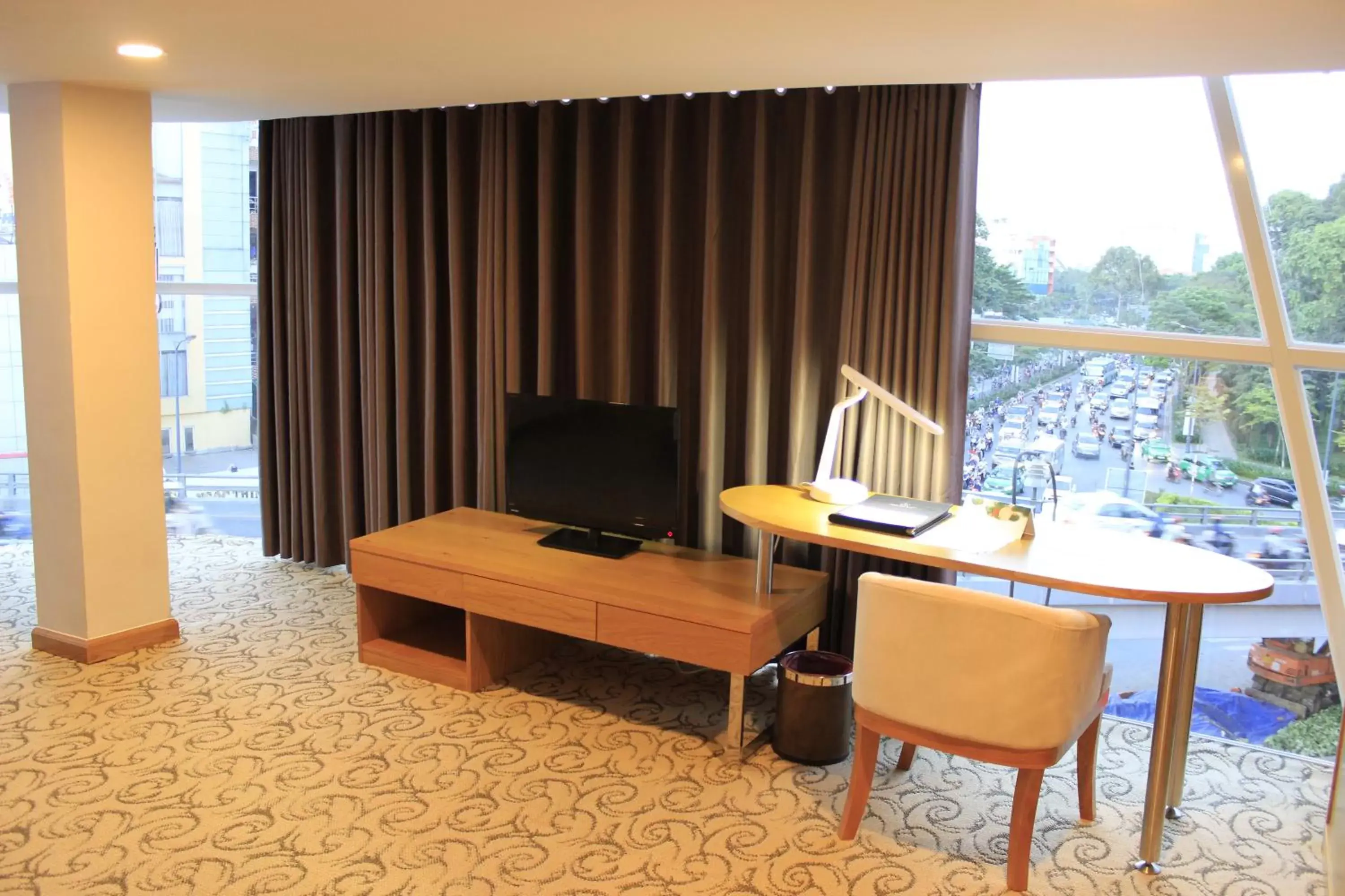 Bed, TV/Entertainment Center in TTC Hotel - Airport