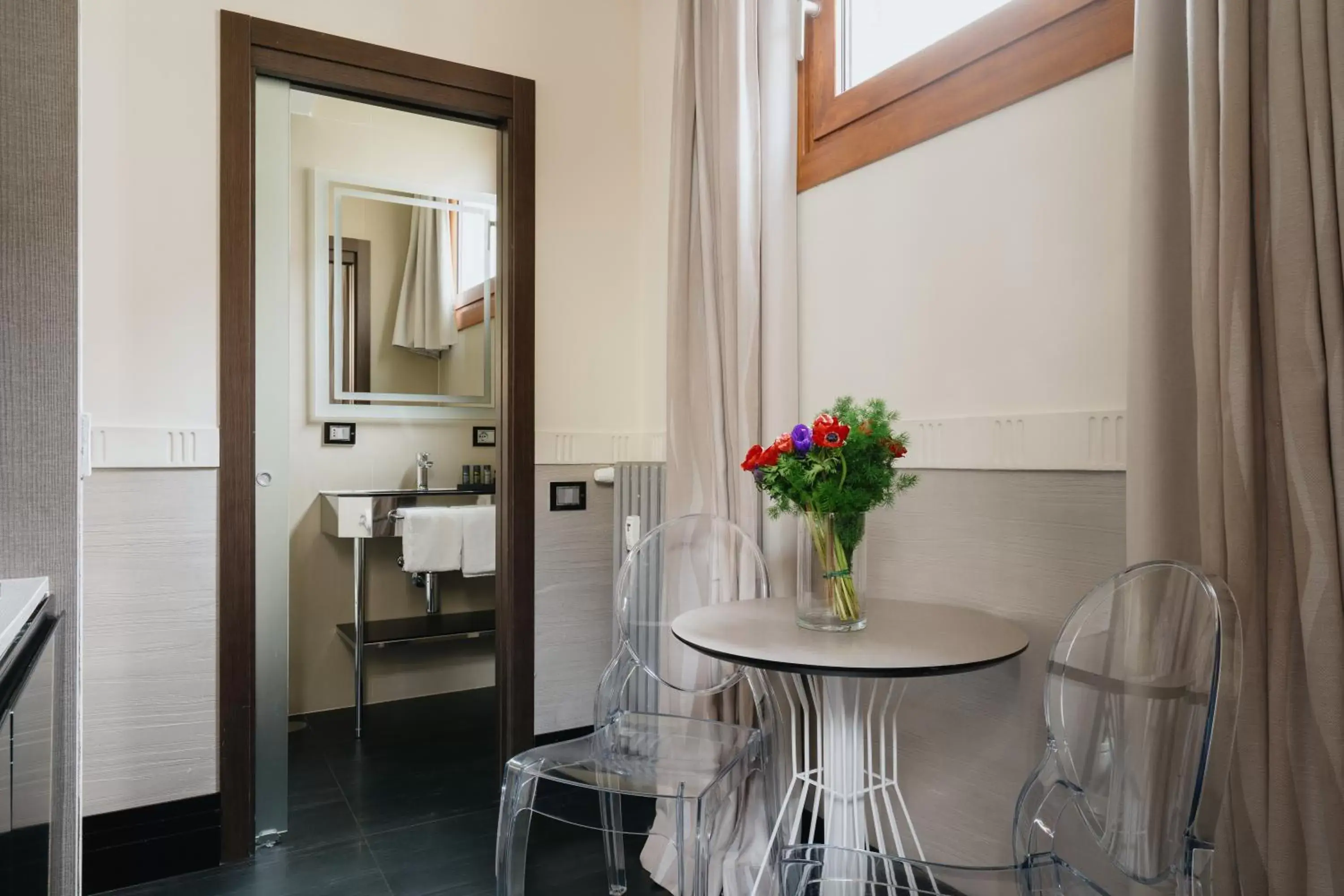 Bathroom, Dining Area in Mood Suites Tritone