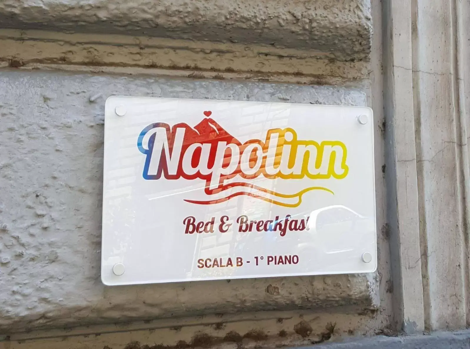 Text overlay, Property Logo/Sign in Napolinn