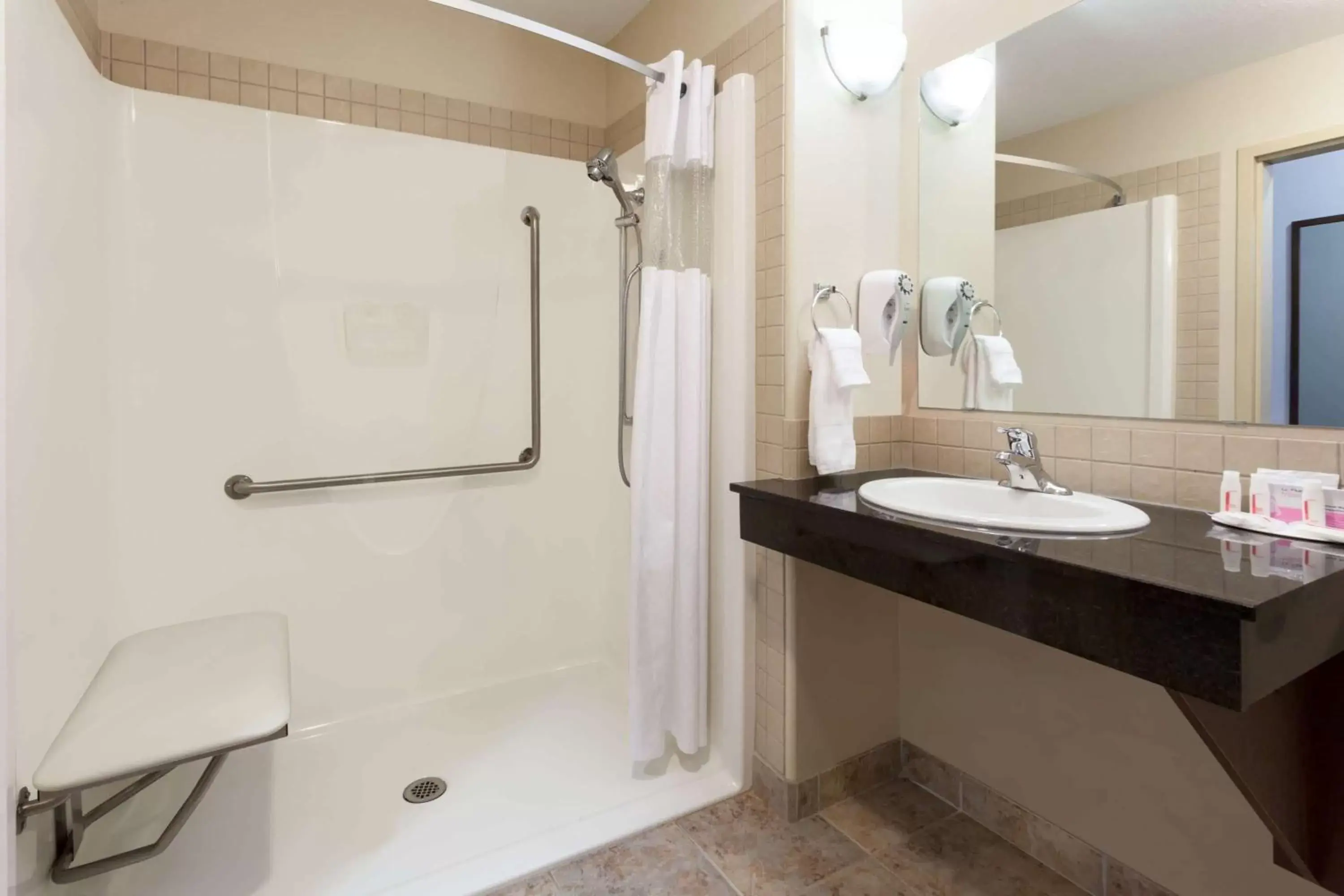 Shower, Bathroom in Ramada by Wyndham Weyburn