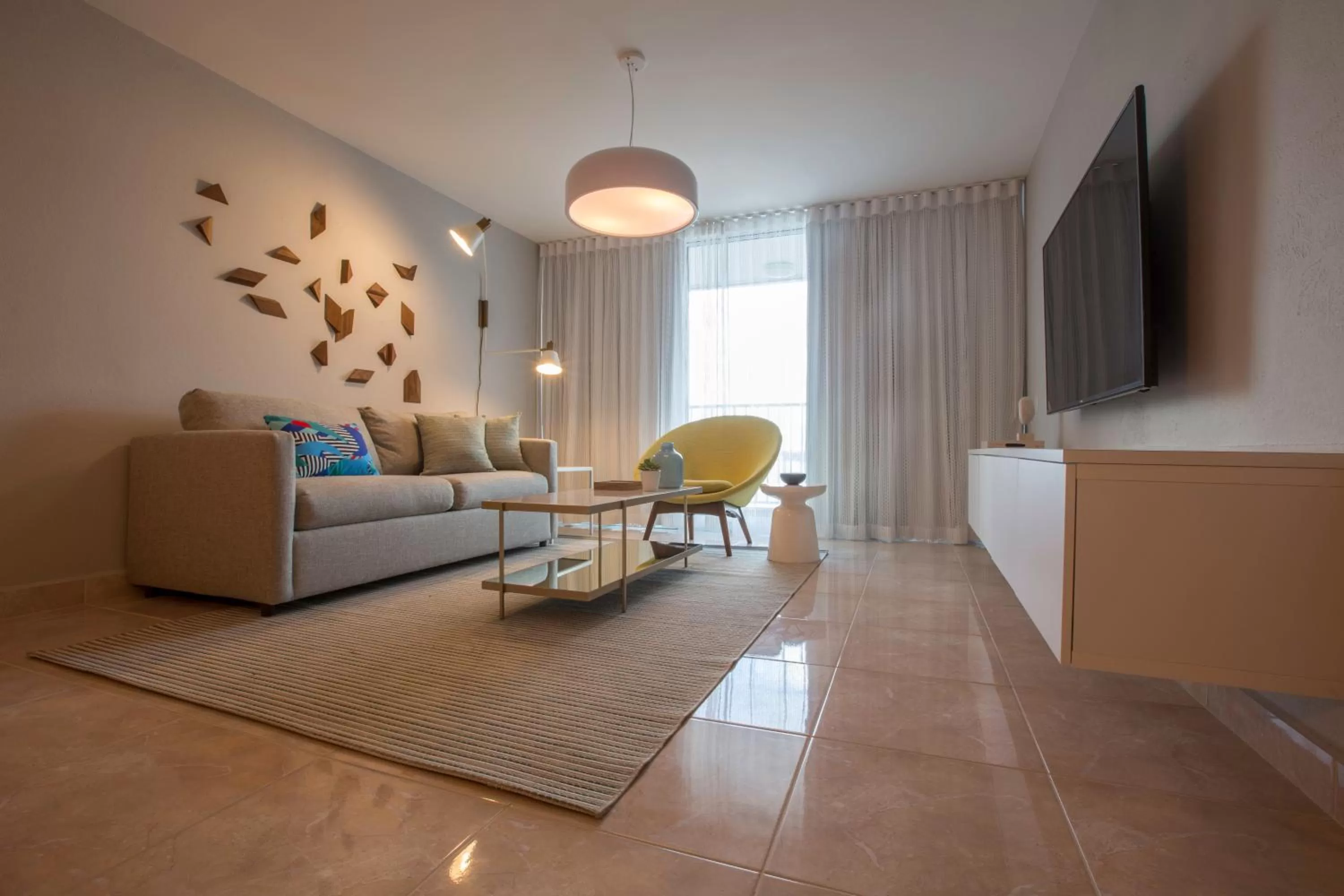 Living room in OCEAN VIEW DELUXE SUITE: PVT. BEACH & POOL