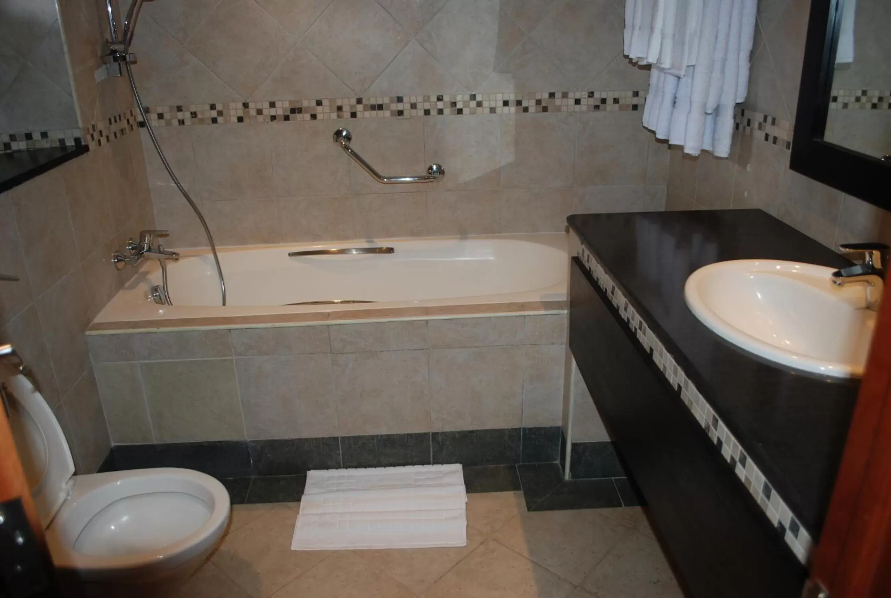 Shower, Bathroom in Sunset Reef Resort & Spa