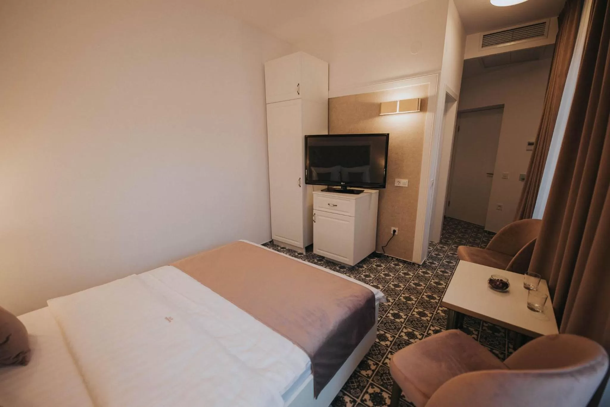 Photo of the whole room, TV/Entertainment Center in Hotel Marabella