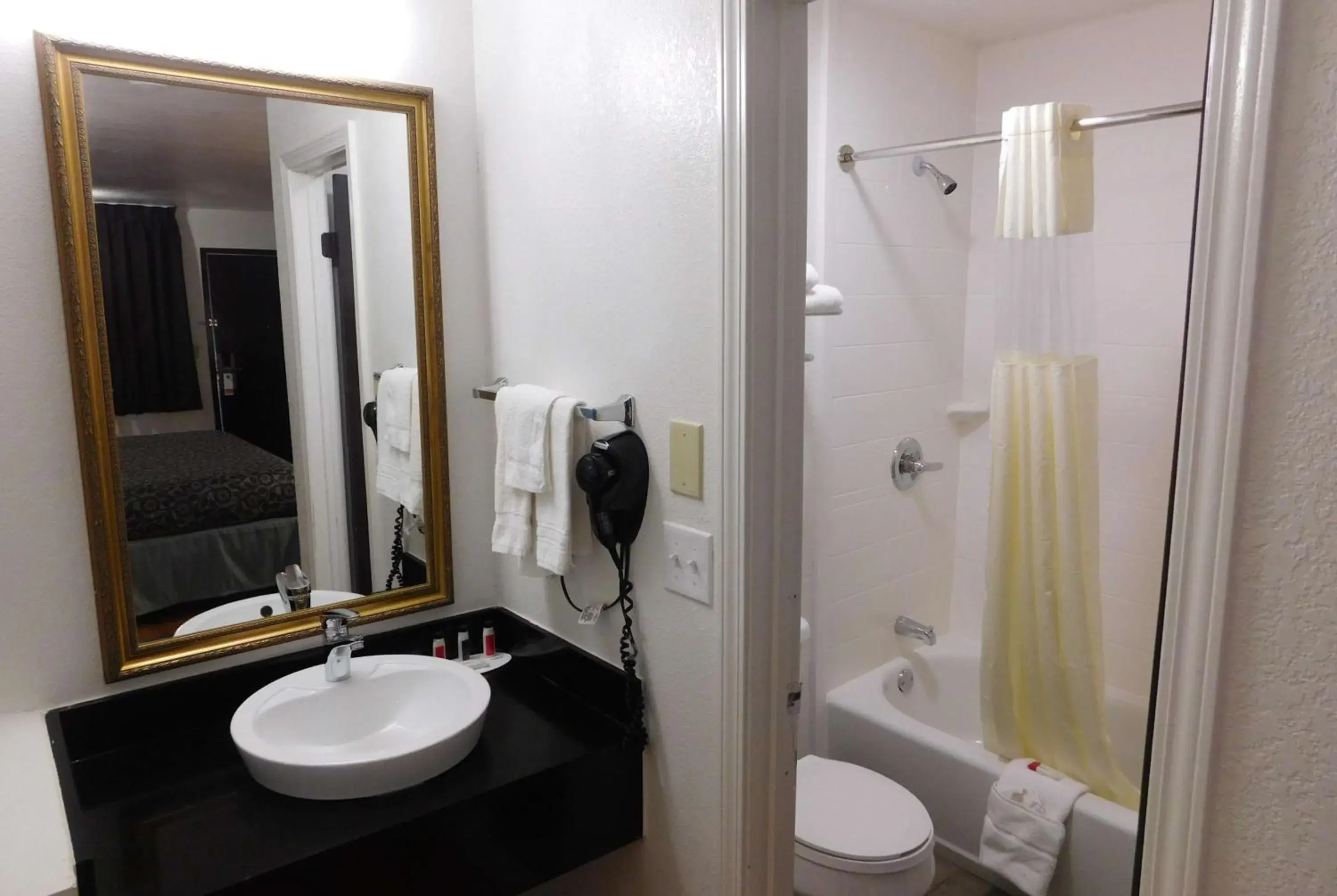 Bathroom in Days Inn by Wyndham Oklahoma City NW Expressway