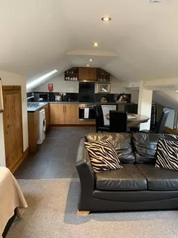 Kitchen or kitchenette, Seating Area in Noble Lands