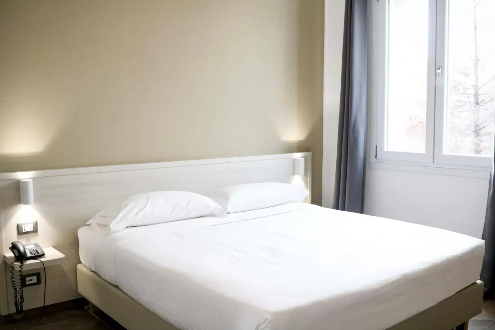 Bed in Hotel Donatello