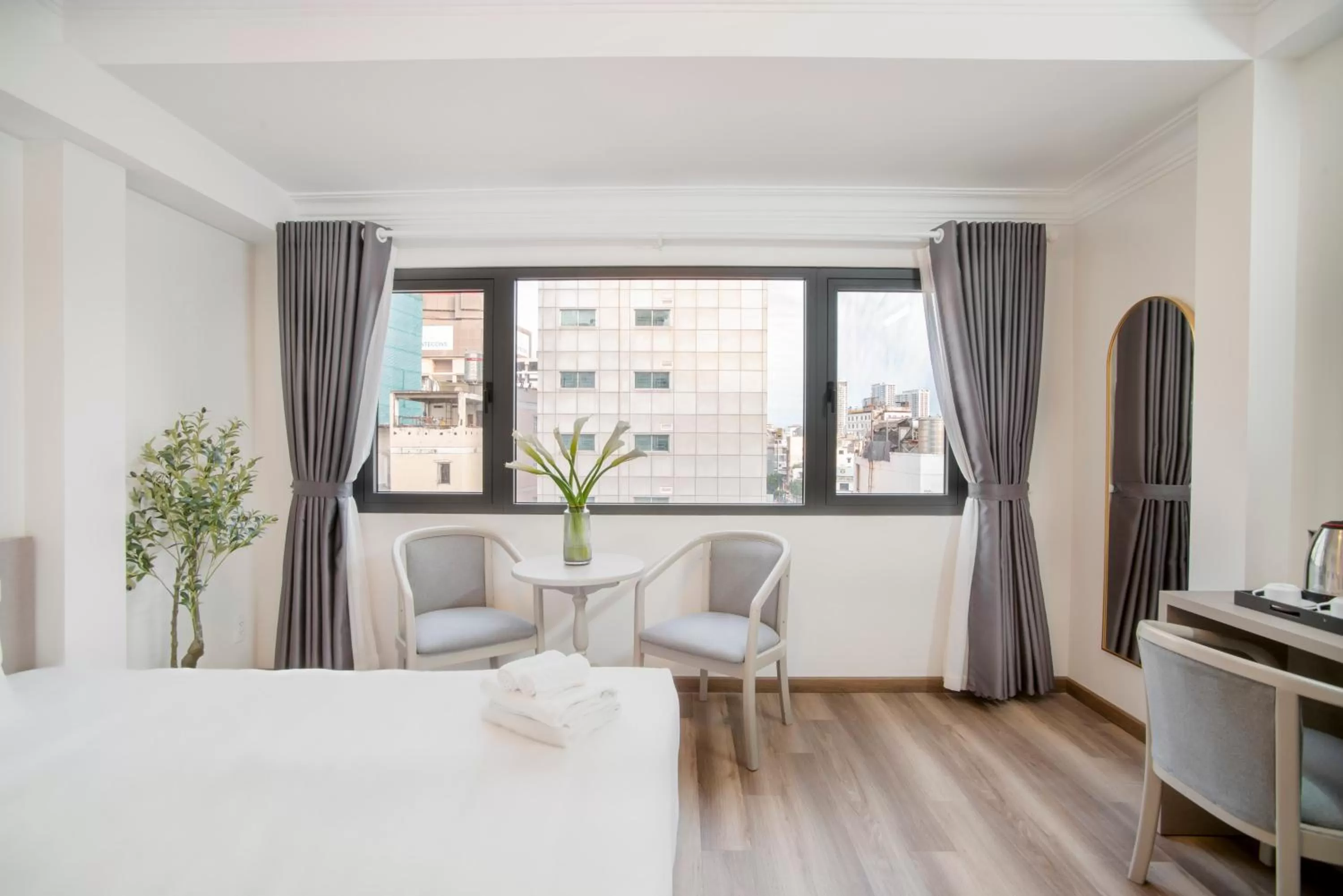 Bed in SAZI BEN THANH Hotel HCM