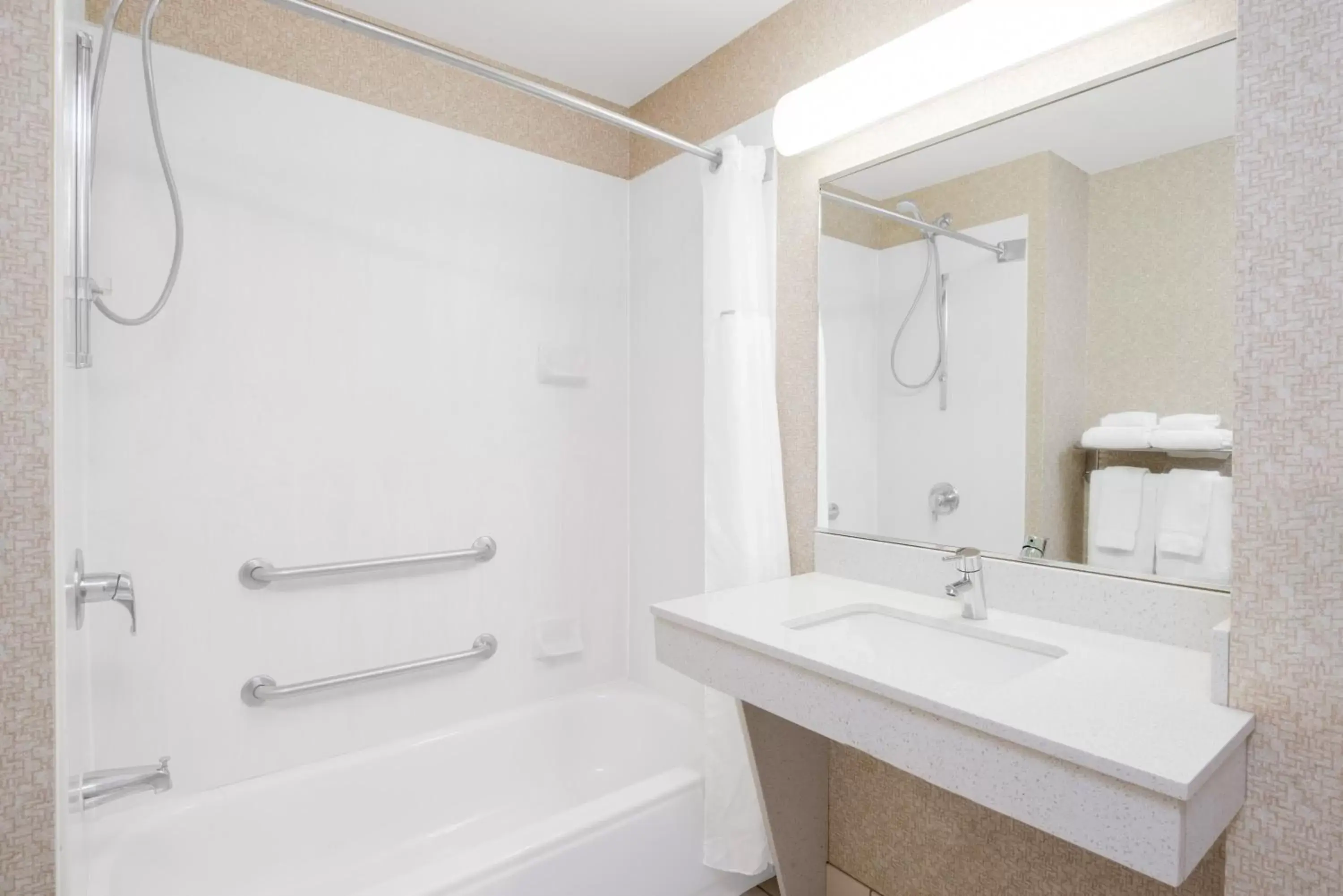 Bathroom in Wingate by Wyndham Gillette near CAM-PLEX