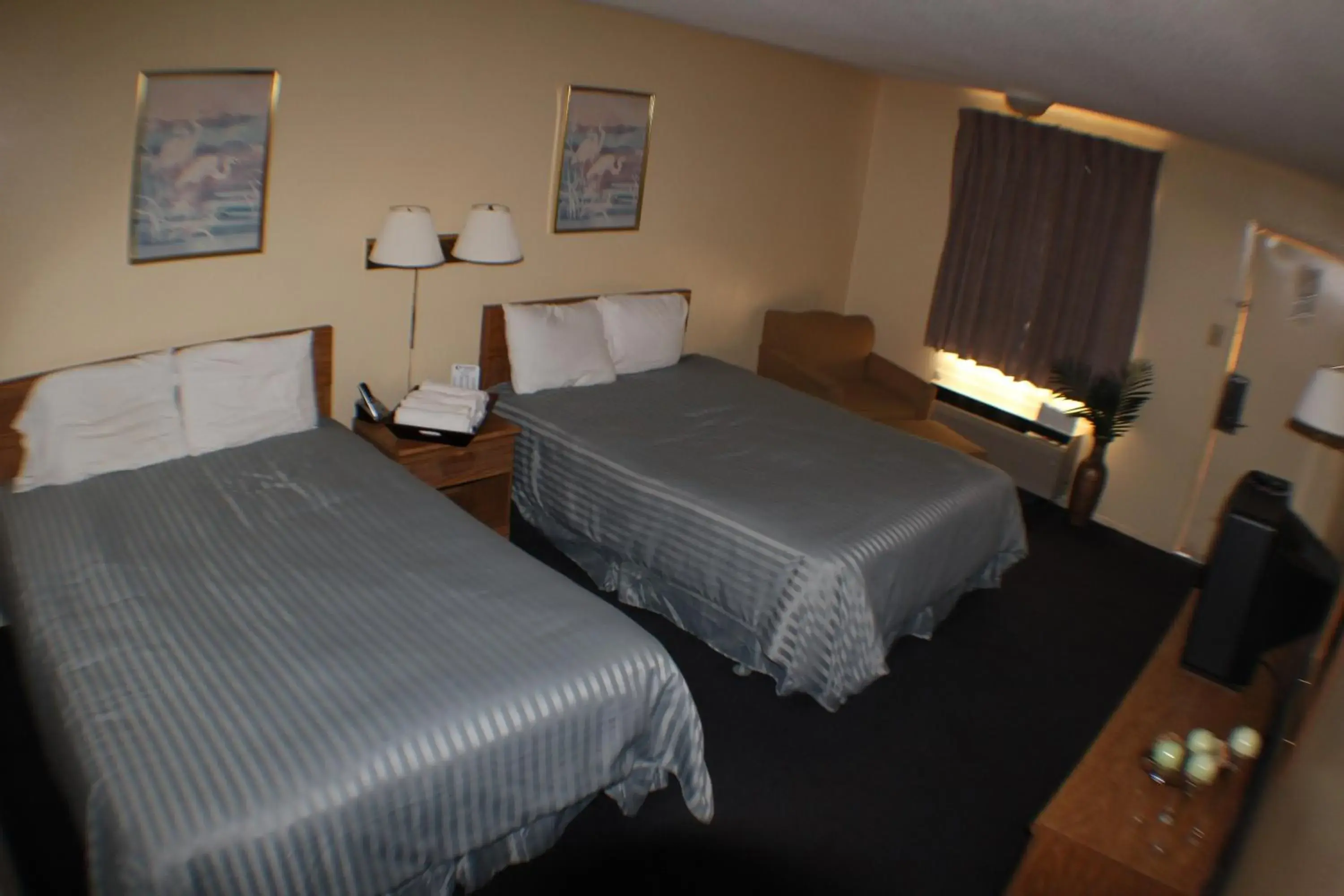 Bed in Value Inn & Suites - Harlingen