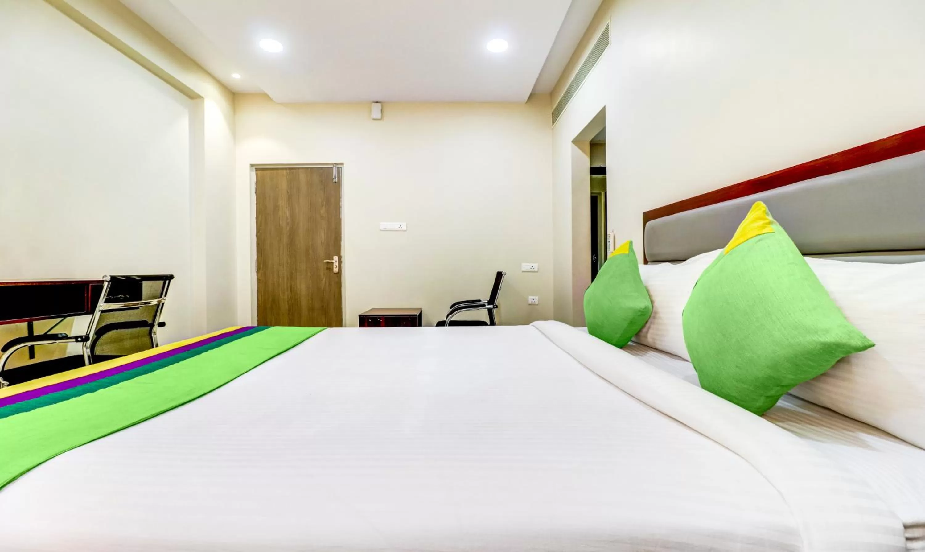 Bedroom, Bed in Treebo Grand Milan