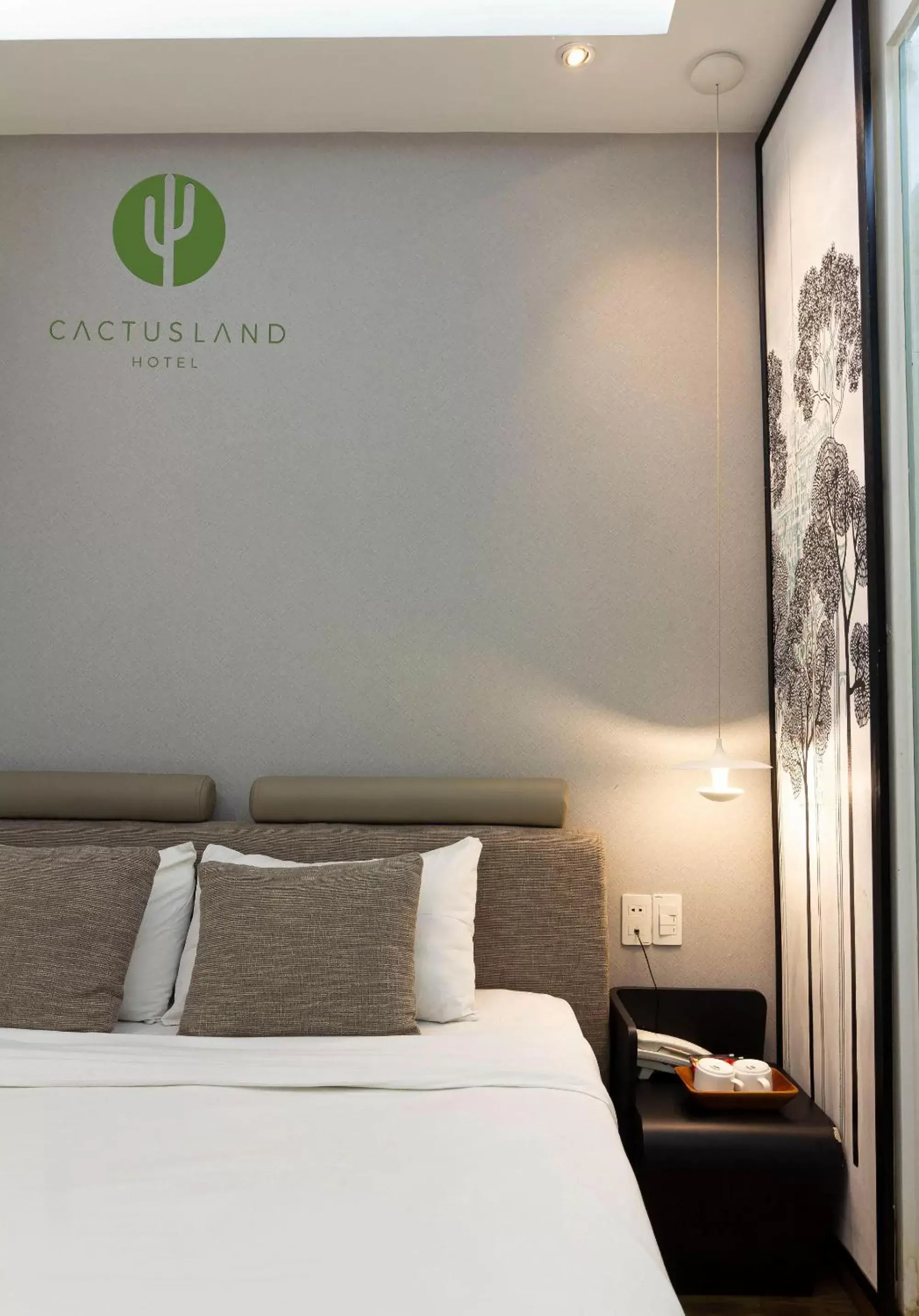 Bed in Cactusland Boutique Hotel