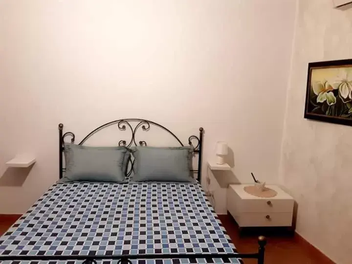 Bed in Nostra Casa suite