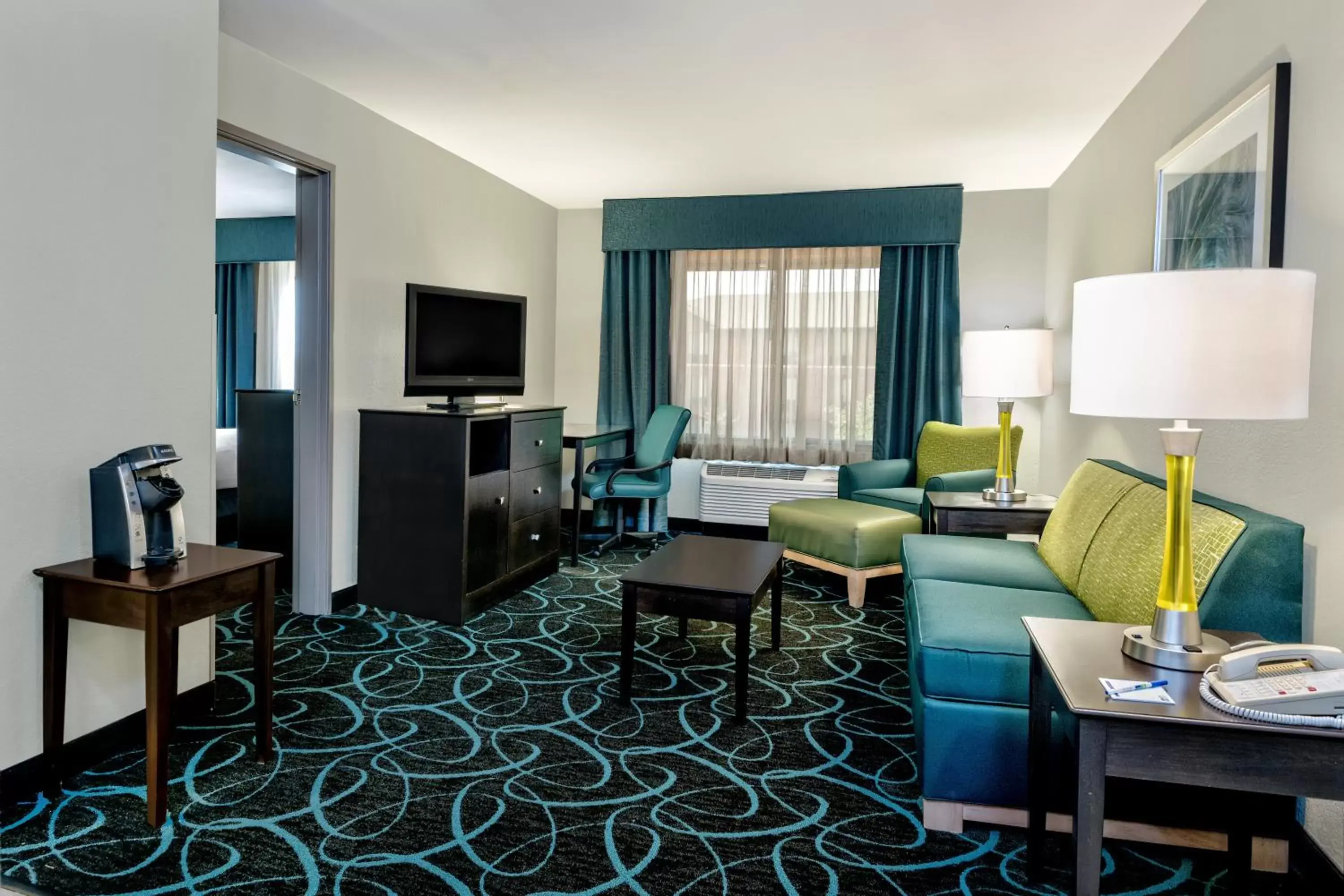 Photo of the whole room, TV/Entertainment Center in Holiday Inn Express Hotel and Suites Fort Worth/I-20