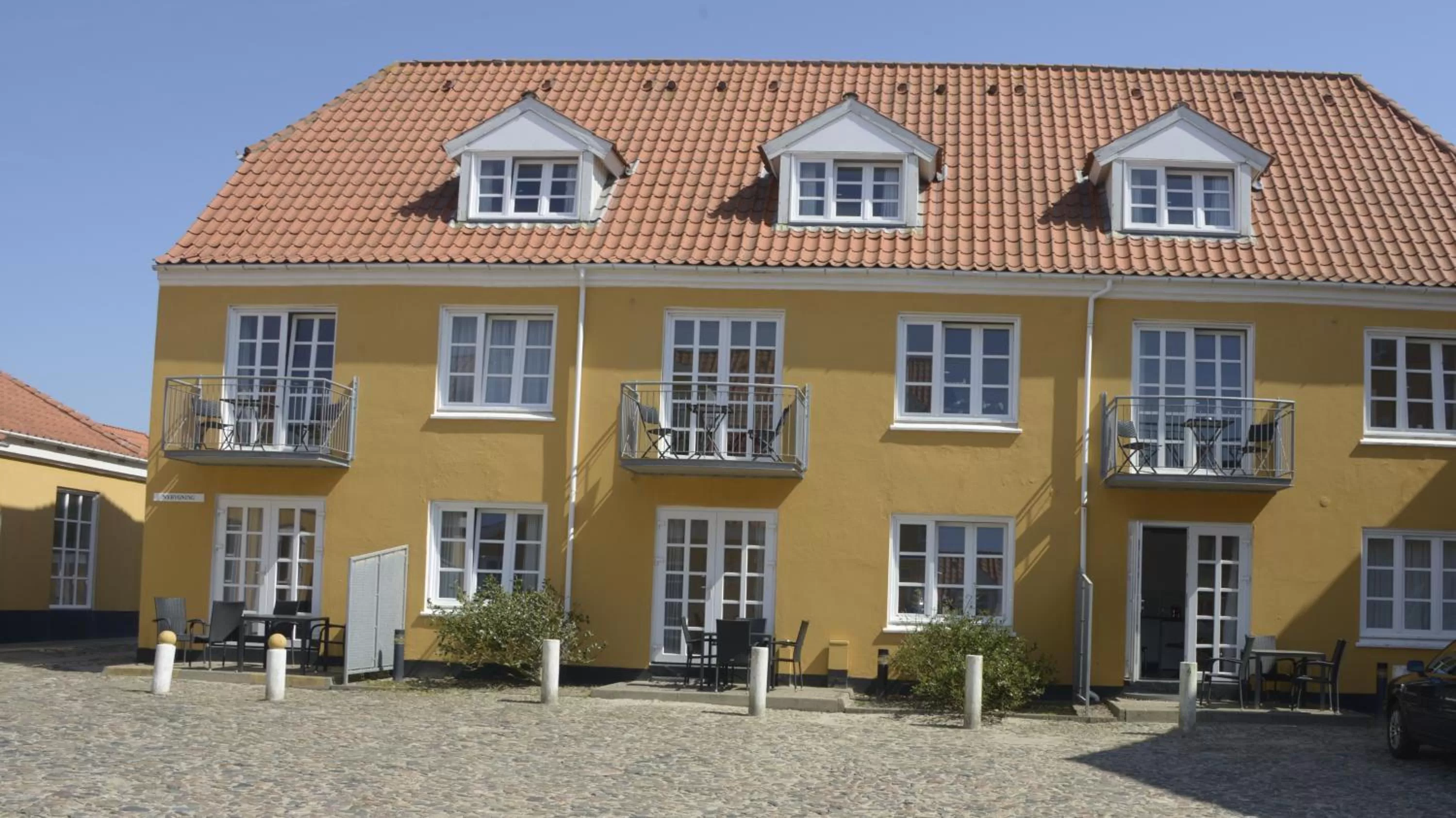 Property building in Løkken Badehotel Apartments