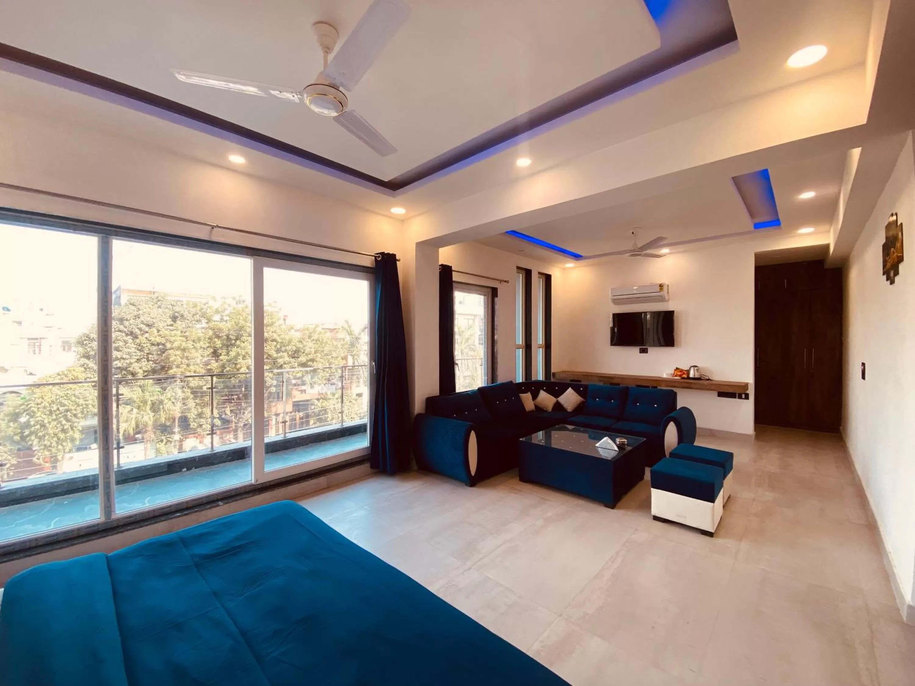 Bedroom, Seating Area in The Metro Stay By F9 Hotels-Near Sector 18 Metro Station Noida