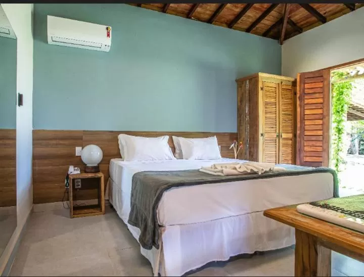 Bed in Angá Beach Hotel