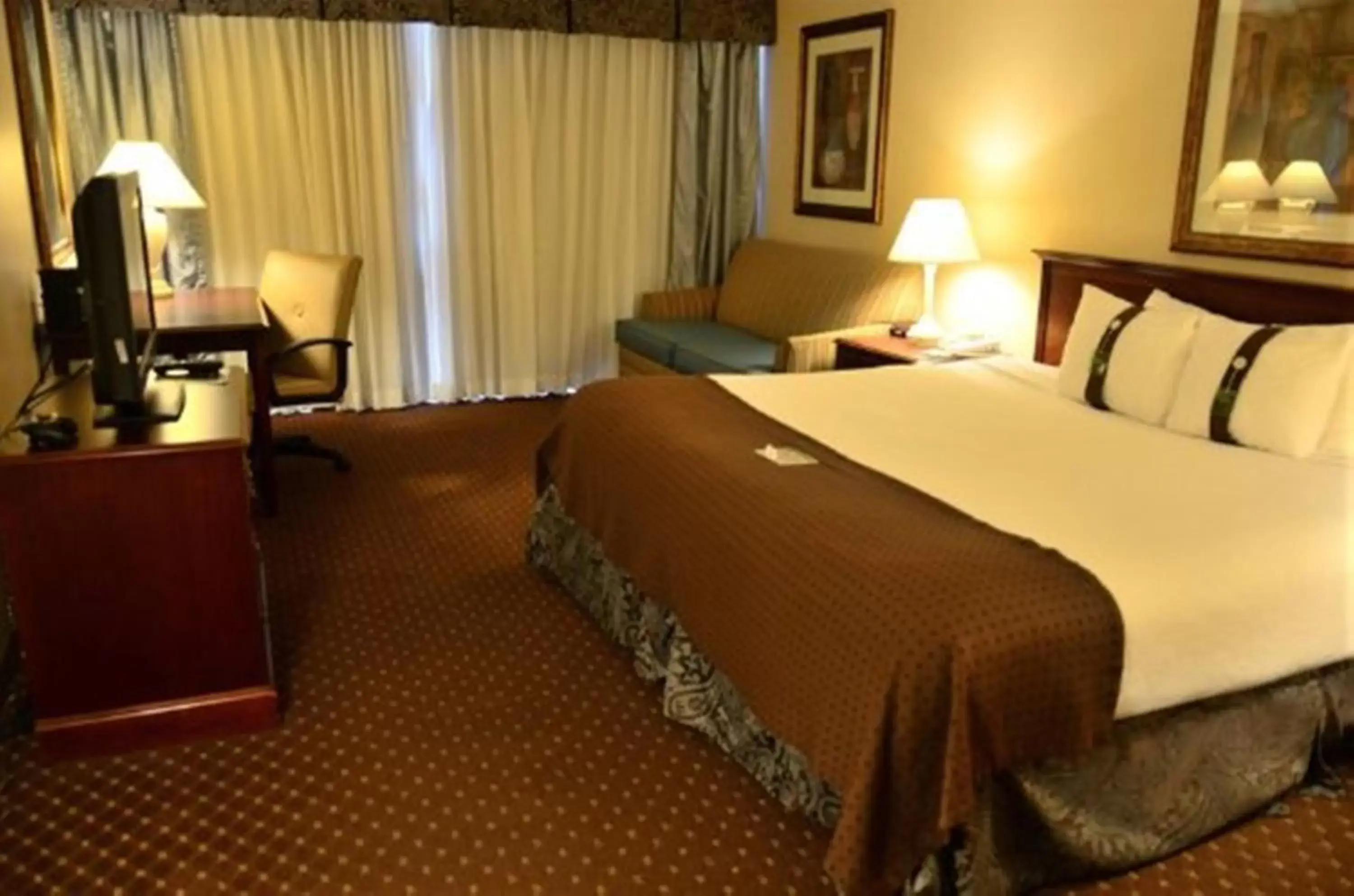 Bed in Wingate by Wyndham Kansas City