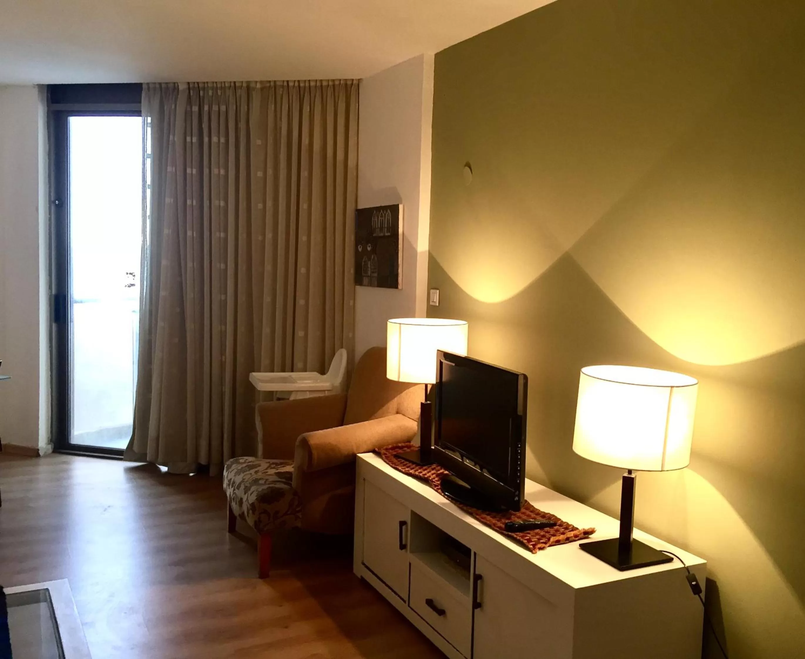 Living room, Bed in Raphael Apartments