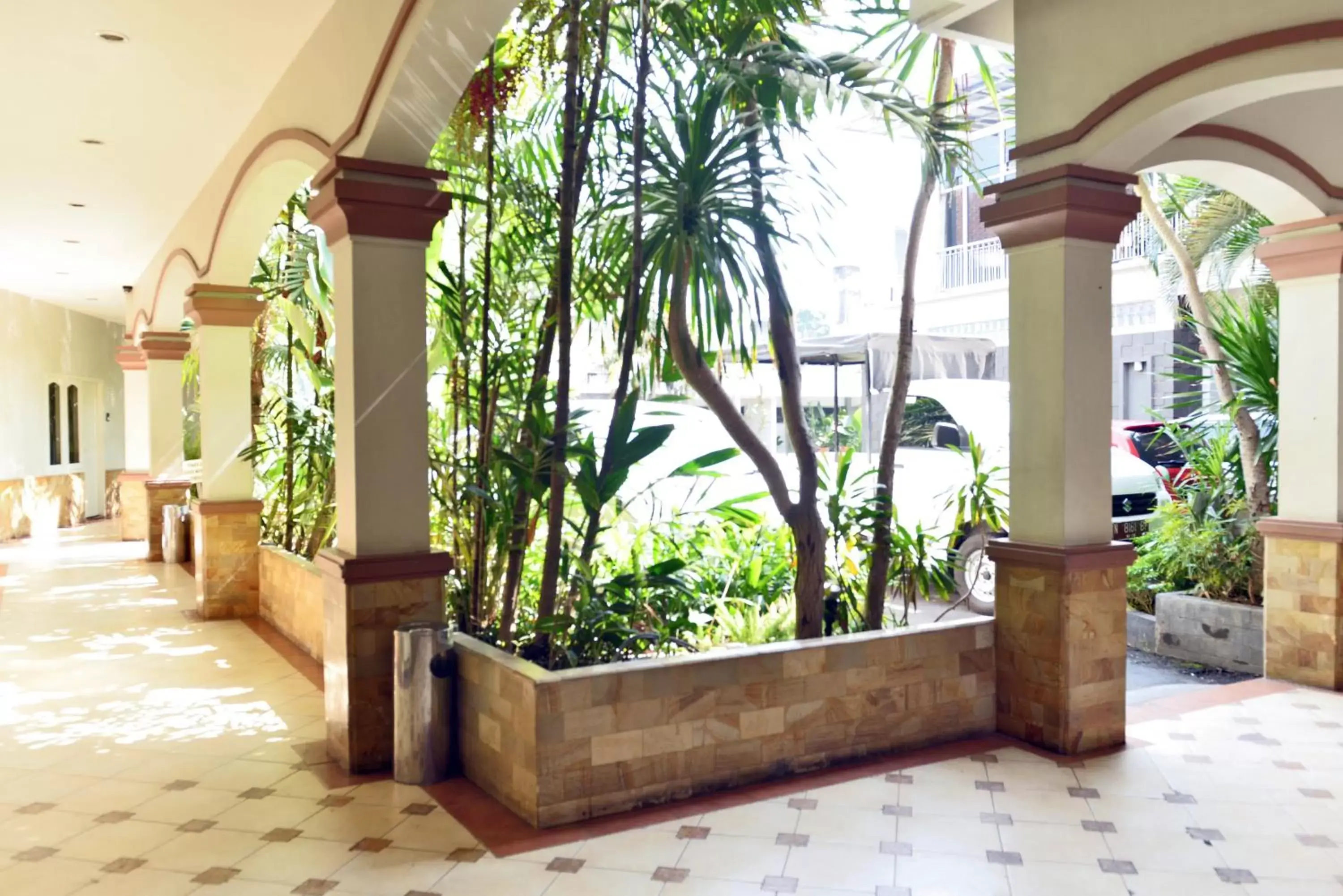 Lobby or reception, Patio/Outdoor Area in Hotel Trio Indah 2