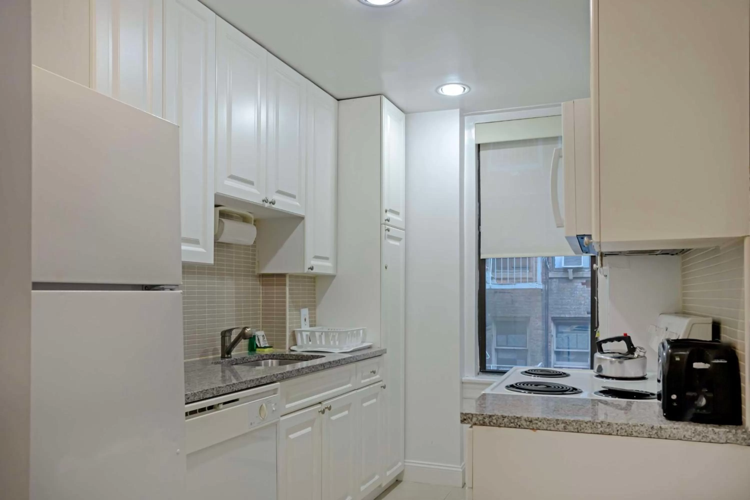 Bedroom in Best Western Plus Hospitality House Suites