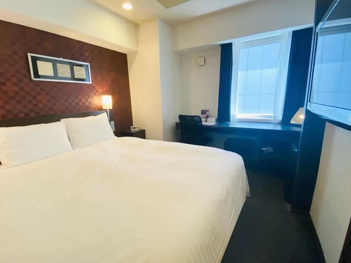 Photo of the whole room, Bed in Smile Hotel Nagoya Sakae