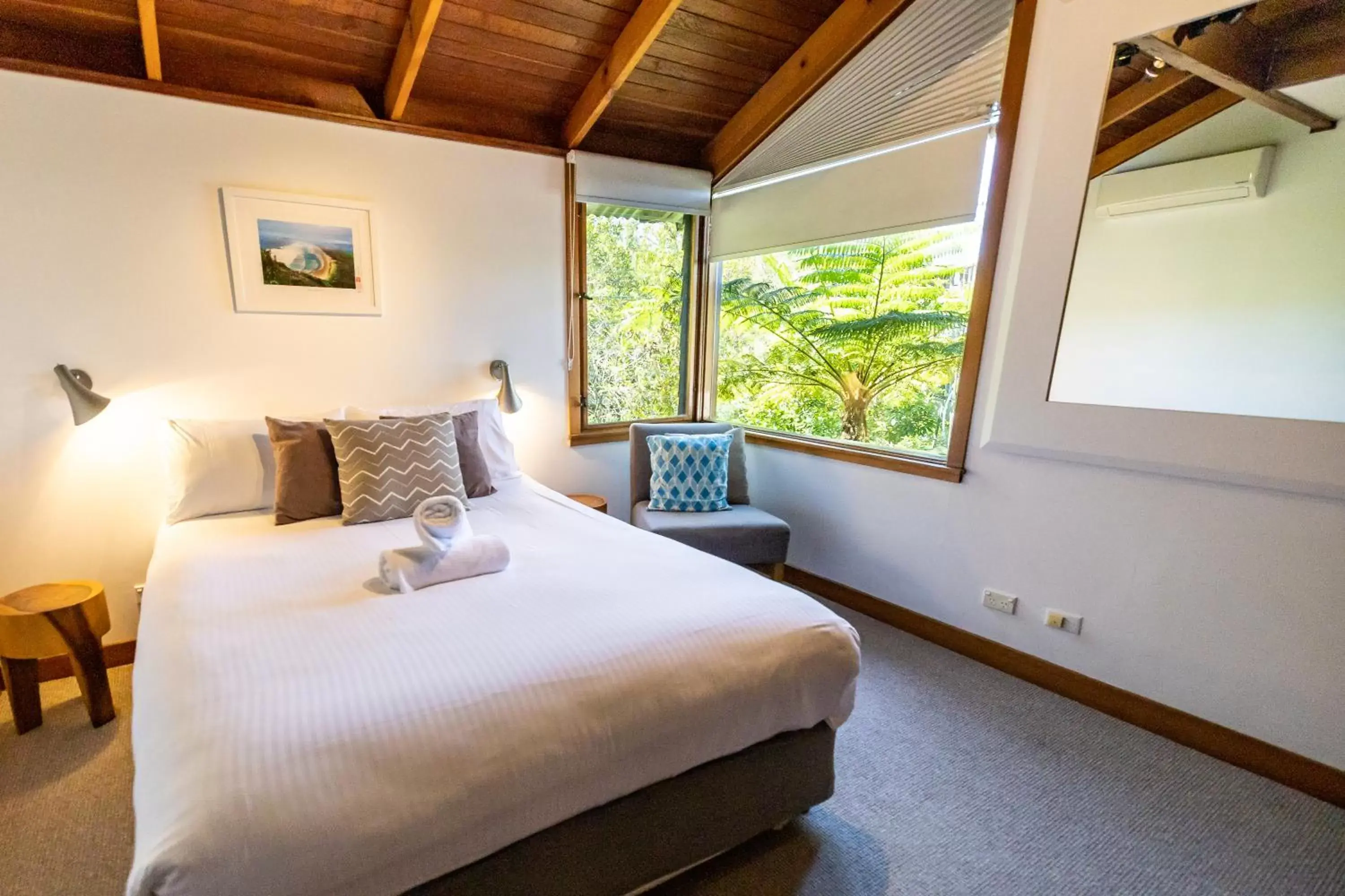 Bedroom, Bed in The Oasis Apartments and Treetop Houses