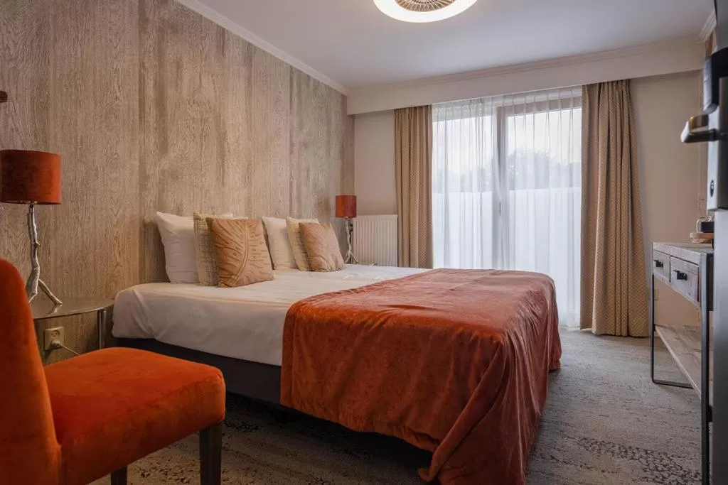 Bed in Boutique Hotel Slenaker Vallei - Buitengewoongenieten