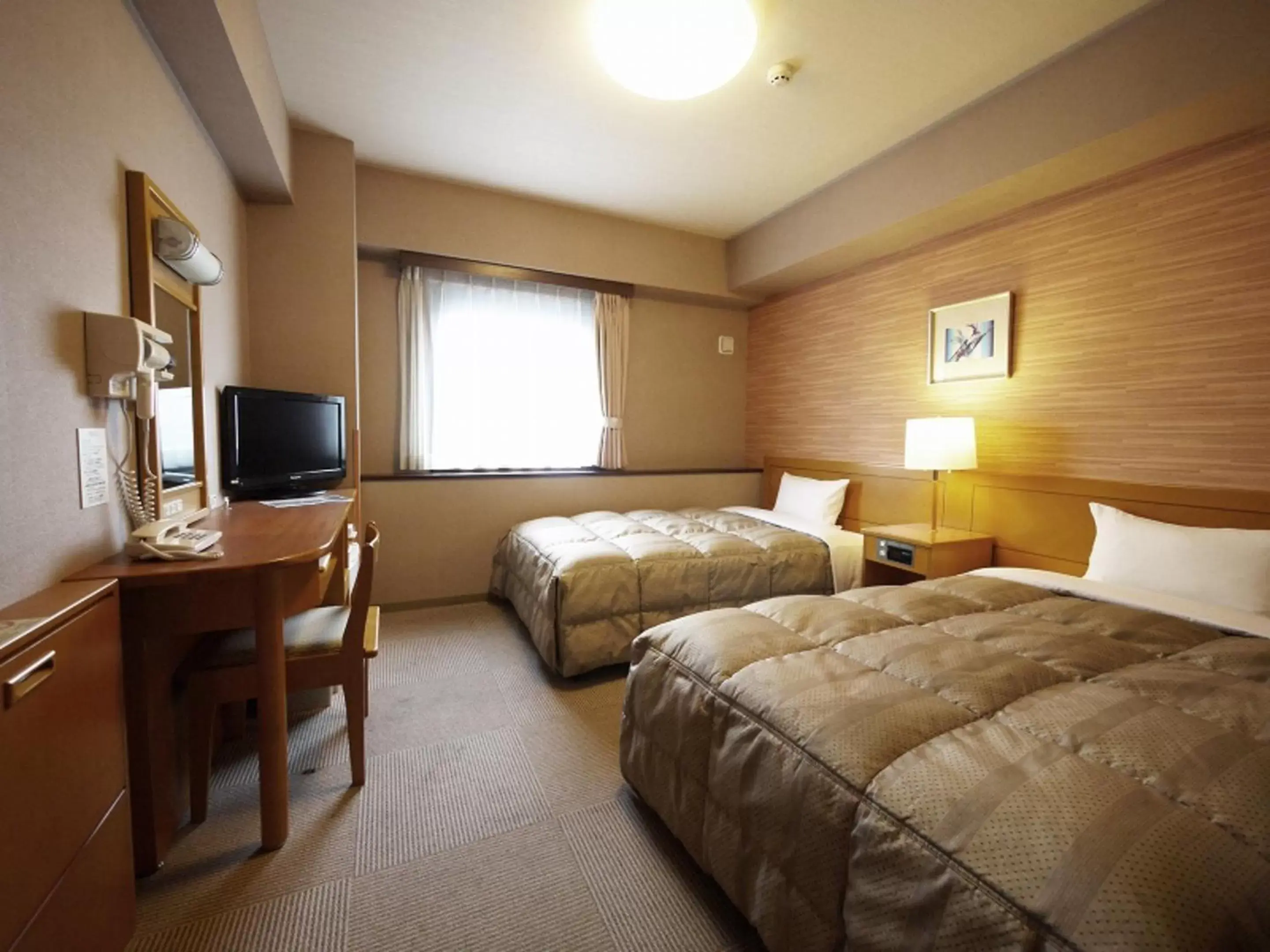 Bed in Hotel Route-Inn Yamagata Ekimae