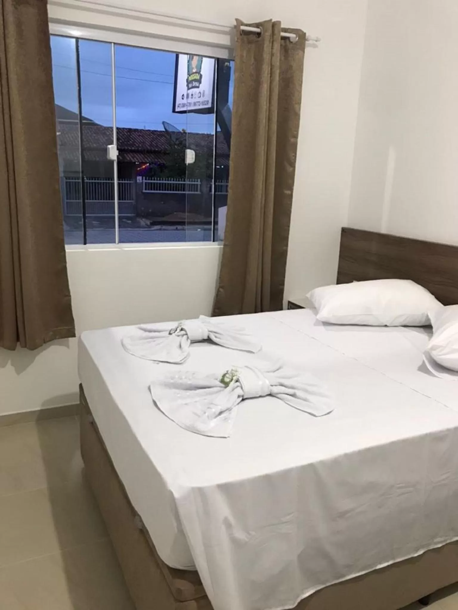 Photo of the whole room, Bed in Pousada Vó Dena