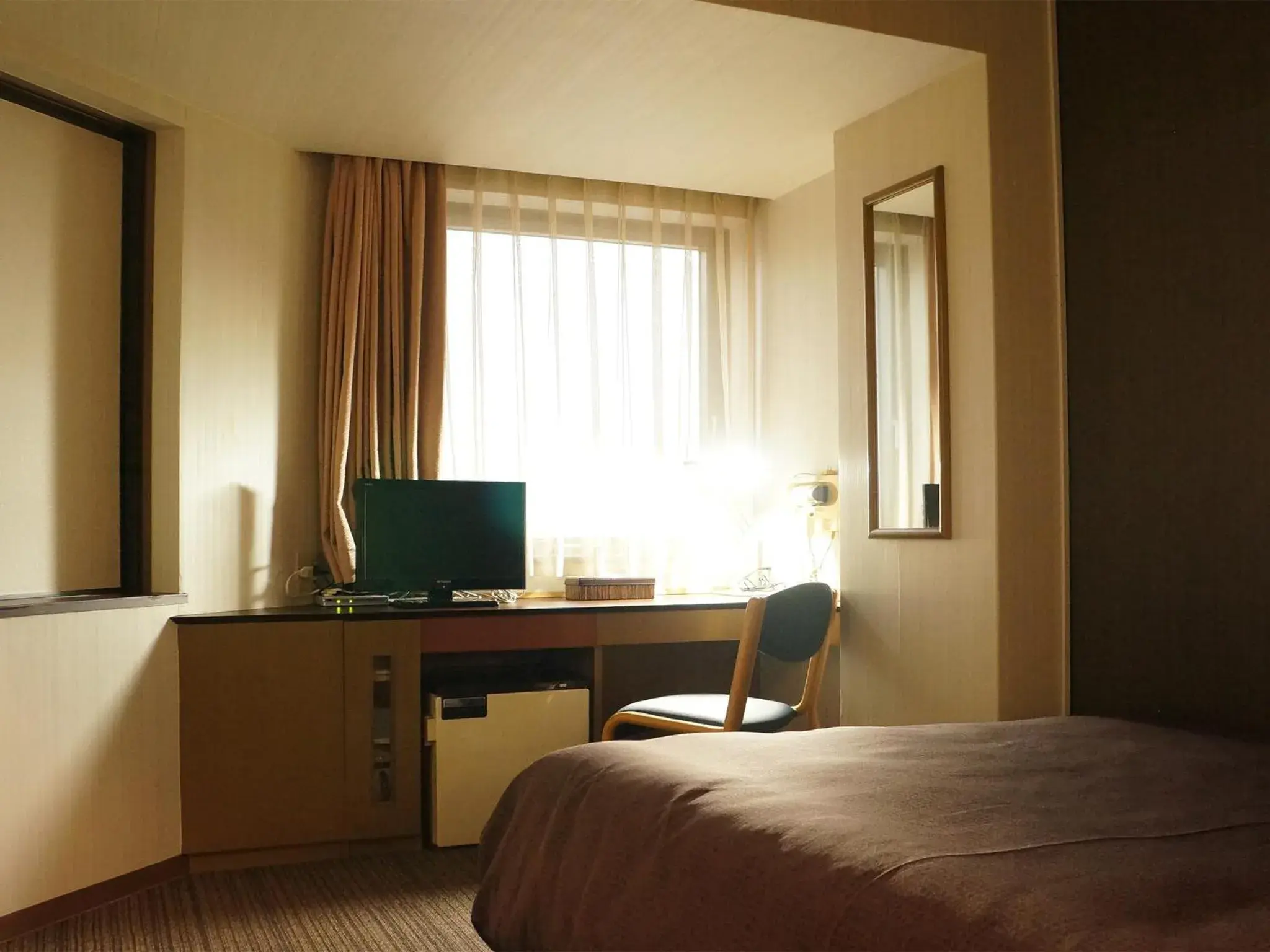 Photo of the whole room, TV/Entertainment Center in HOTEL LiVEMAX BUDGET Amagasaki