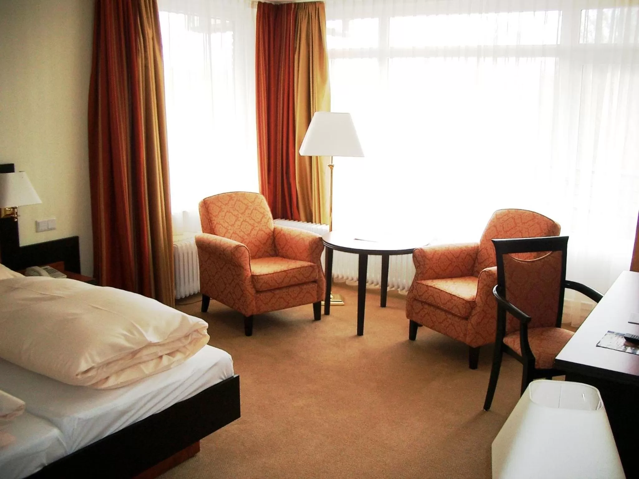 Seating area, Bed in Hotel Hof Sudermühlen